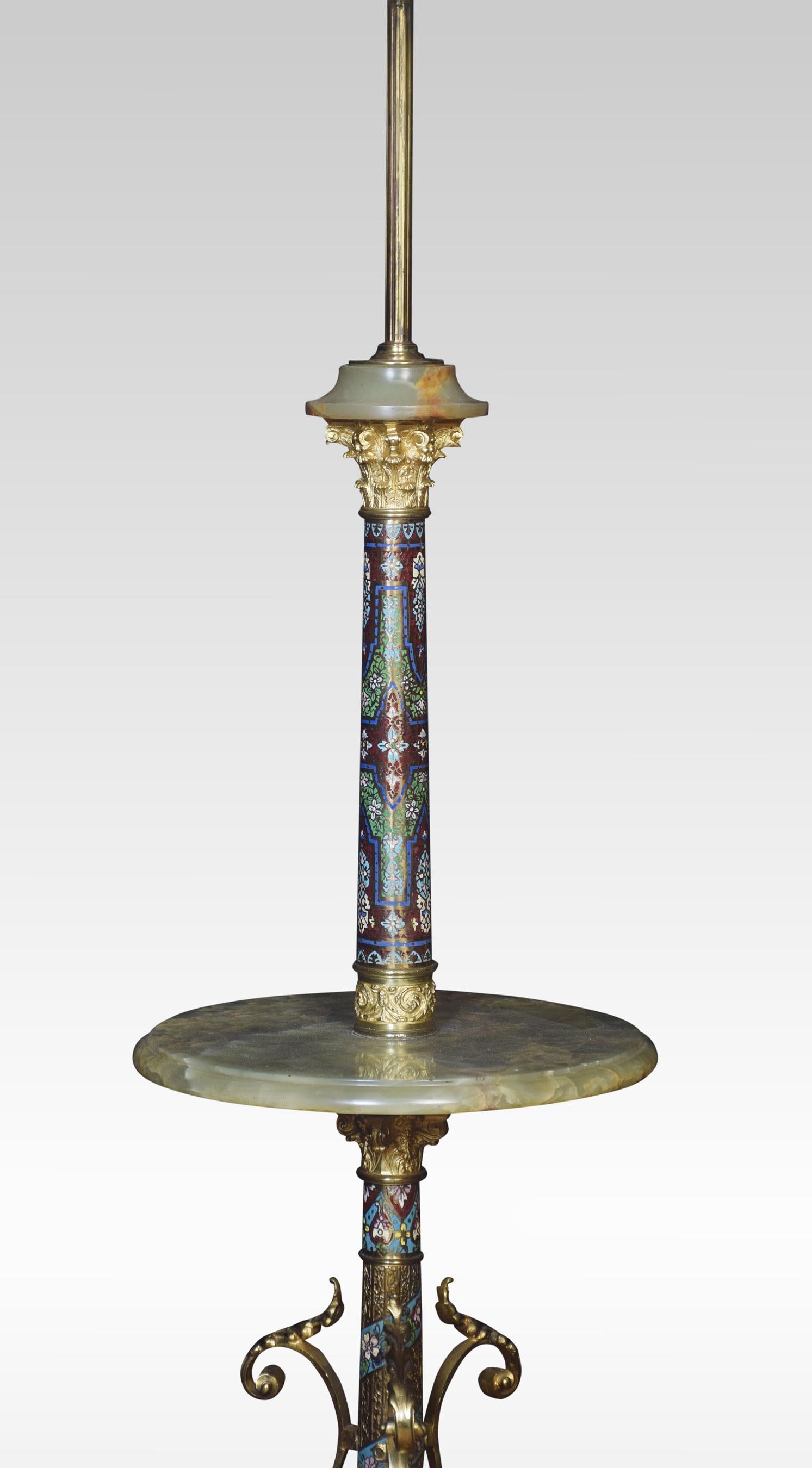 Champlevé and green onyx standard lamp, on fixed column support above a leaf cast capital and circular onyx shelf, the base joined by acanthus detail and scrolled feet.
Dimensions:
Height 61 inches
Width 21.5 inches
Depth 21.5 inches.