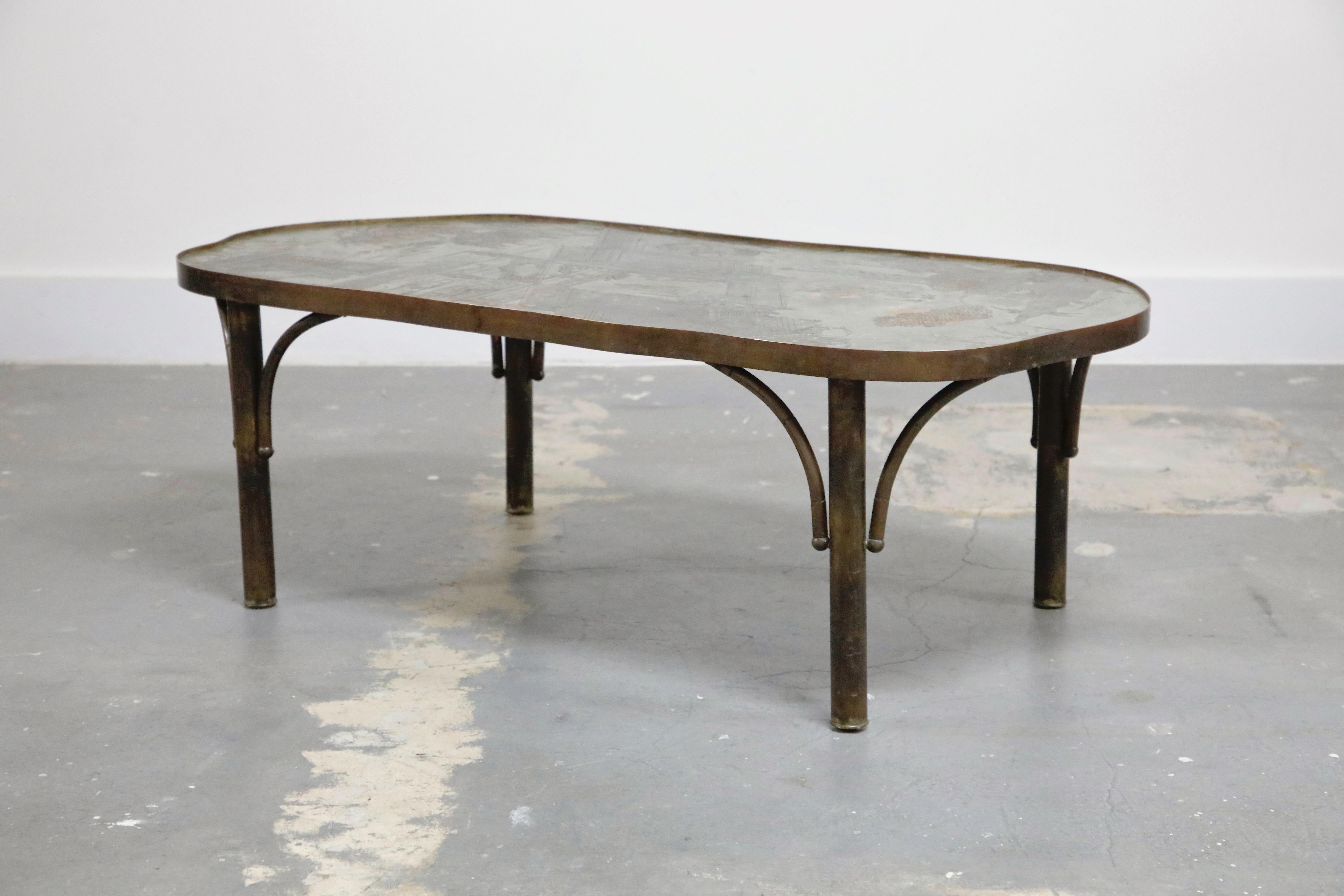 This is an excellent collectors example of the rare and sought after 'Chan 140' cocktail table by father and son team, Philip and Kelvin LaVerne, produced in the 1960s. Ingeniously designed with hand carved burnished bronze inset into pewter, then