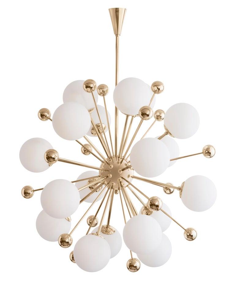 Chandelier 01 version 2 by Magic Circus Editions
Dimensions: H 110 x W 90 cm
 Spheres: Glass 140
 Brass 60
Materials: Smooth brass, mouth blown glass
Available finishes: brass, Nickel, Lacquered Black, Red Brick
18 × Led G9 / 5W. 220V 

All