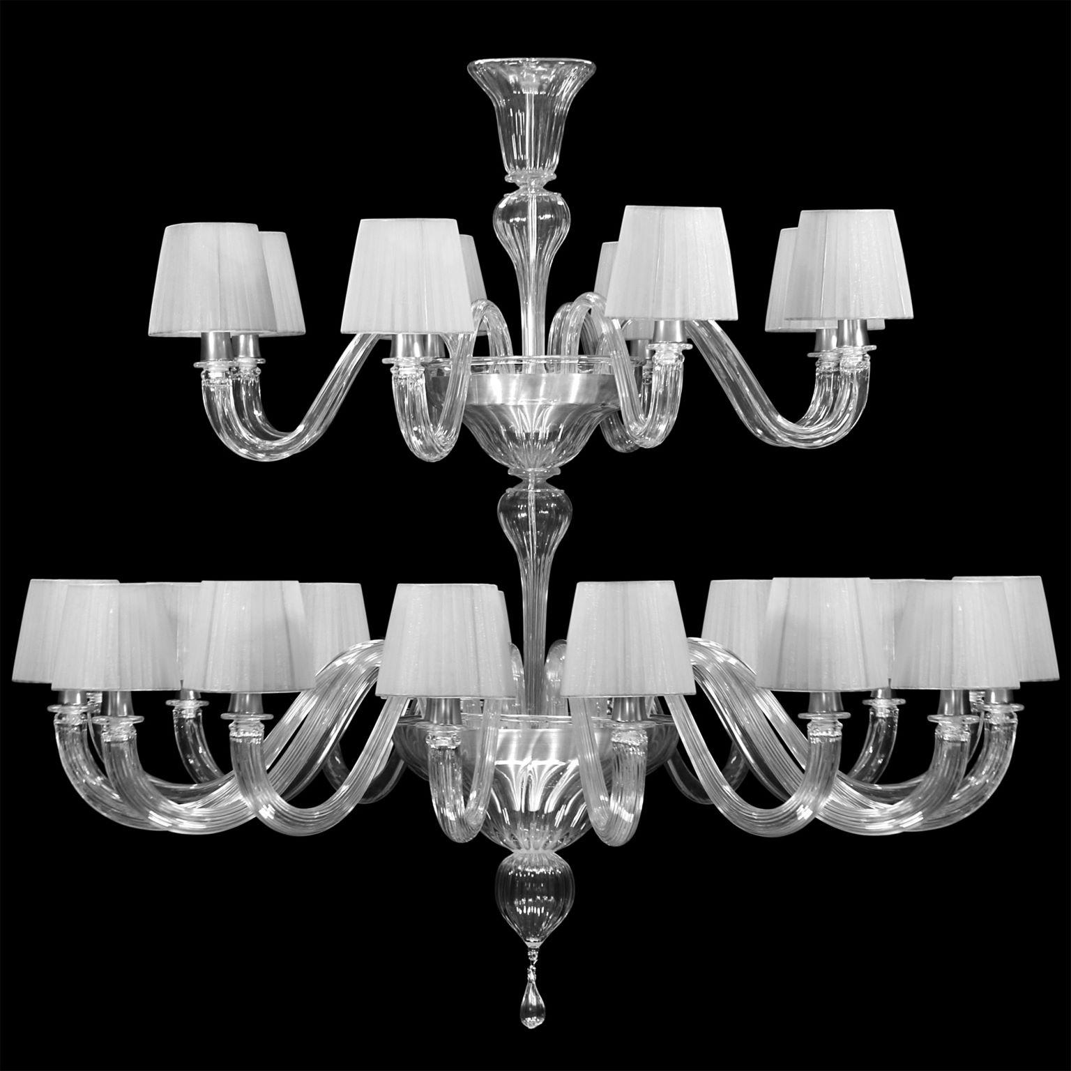 Chapeau chandelier 16+8 lights crystal Murano glass, in two tiers, silver organza handmade lampshades by Multiforme.
Chapeau is a Classic and essential chandelier, it is handcrafted using high quality materials in Murano glass and handmade cotton