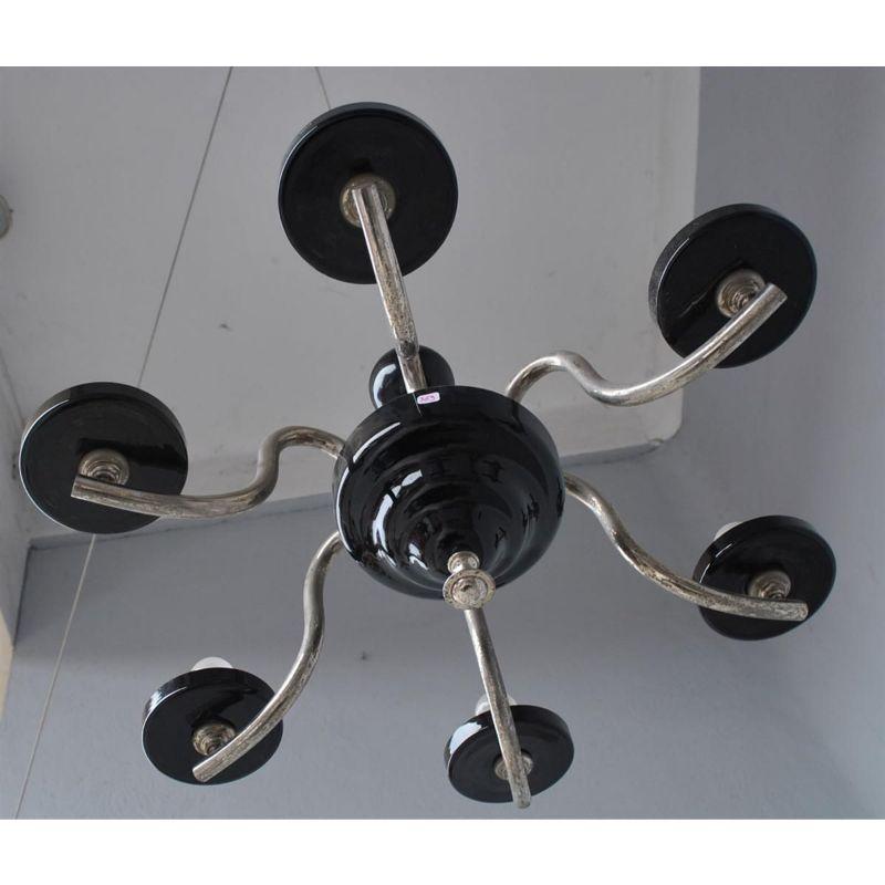 Chandelier 1930 tubular arms with 6 lights cups and balls in black opaline of dimensions height 90 cm for a diameter of 72 cm.

Additional information:
Material: Metal & wrought iron
Style: 1930s art deco.