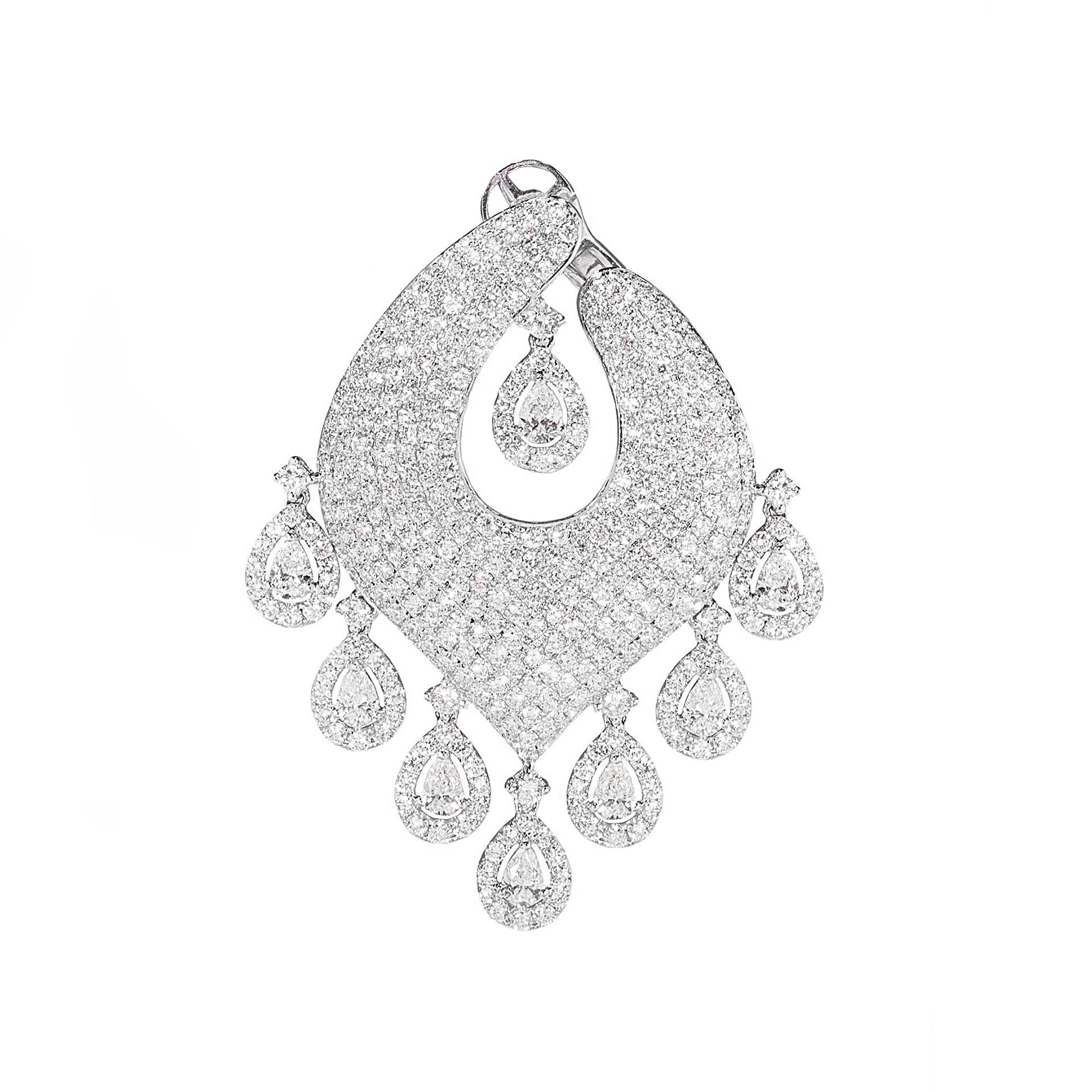 These hand made chandelier and diamond dangle earrings are crafted in 18 karat white gold. The total diamond weight in the earrings are 14.01 carats. There are 16 dangling pear shapes weighing a total of 3.19 carats. Each stone is surrounded by a
