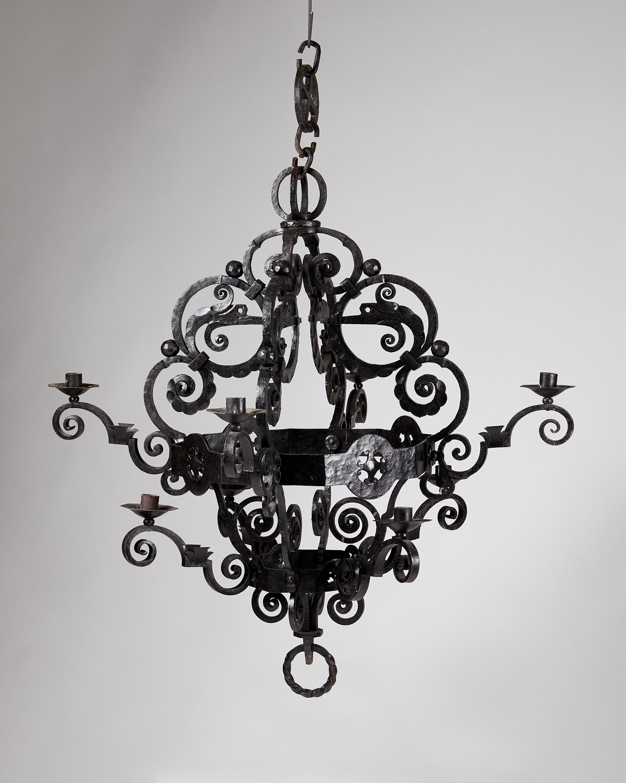 Mid-Century Modern Forged Iron Chandelier, Anonymous, 'Old Nordic' Style, Sweden, Early 1900s. For Sale