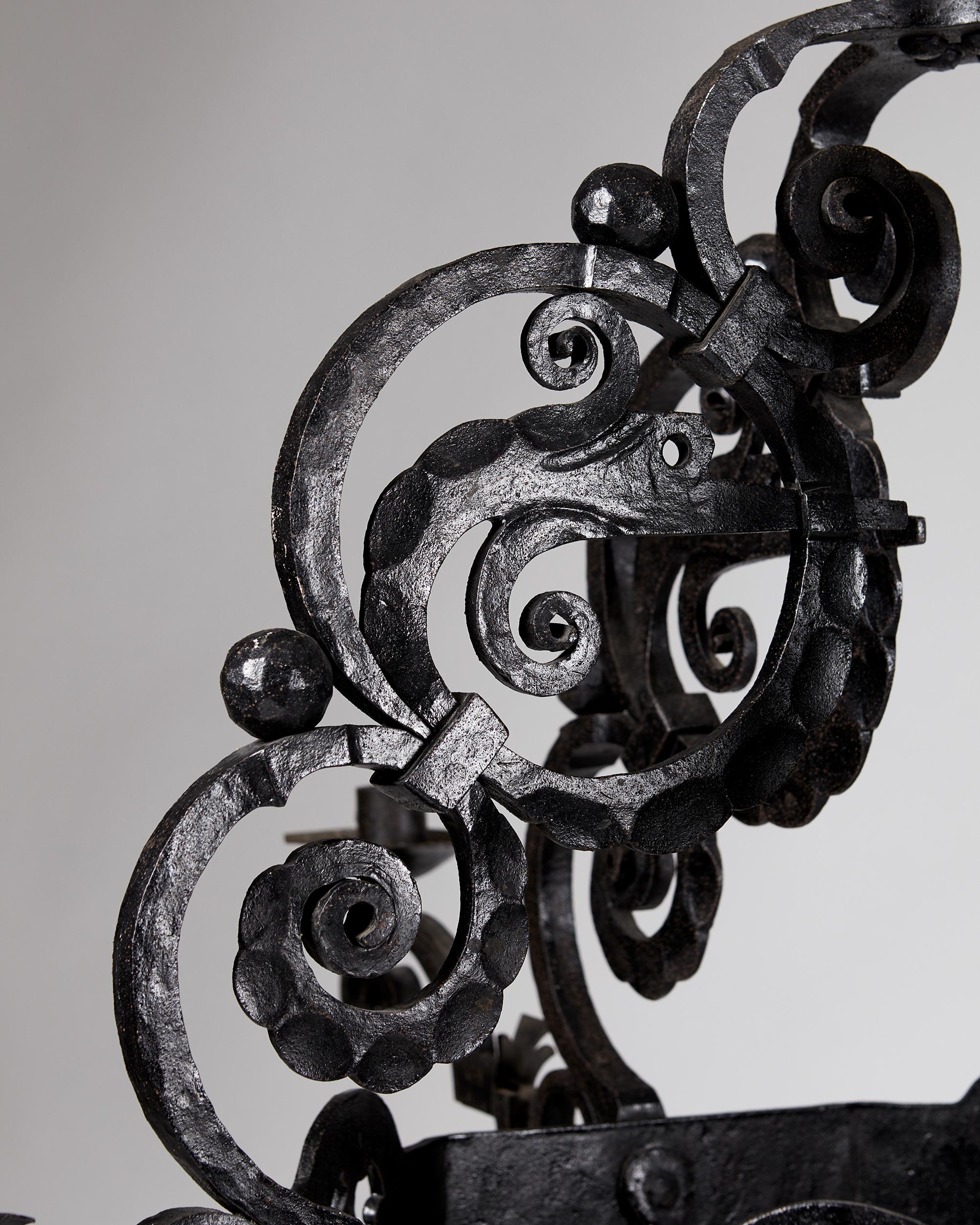 Swedish Forged Iron Chandelier, Anonymous, 'Old Nordic' Style, Sweden, Early 1900s. For Sale