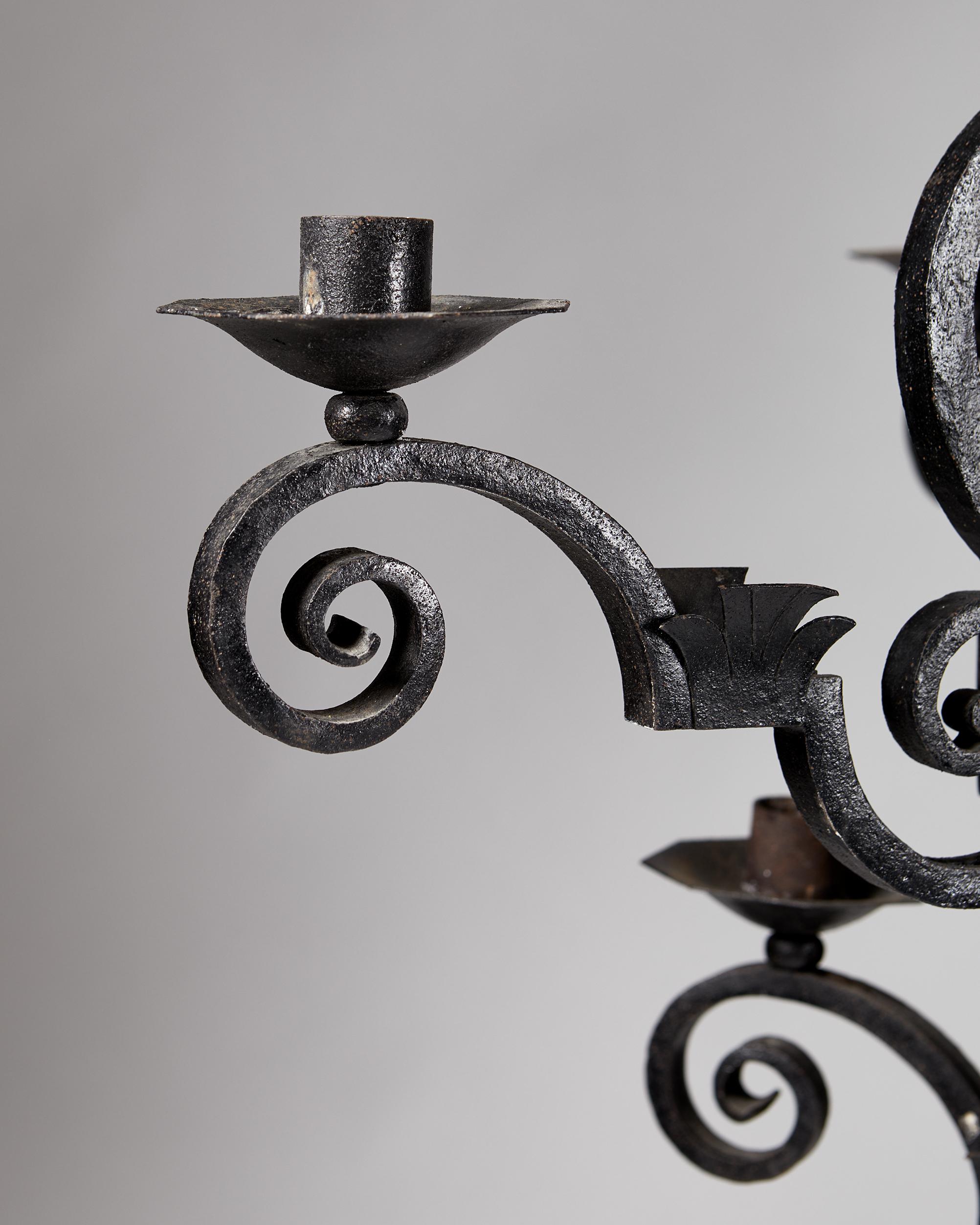 Forged Iron Chandelier, Anonymous, 'Old Nordic' Style, Sweden, Early 1900s. In Fair Condition For Sale In Stockholm, SE