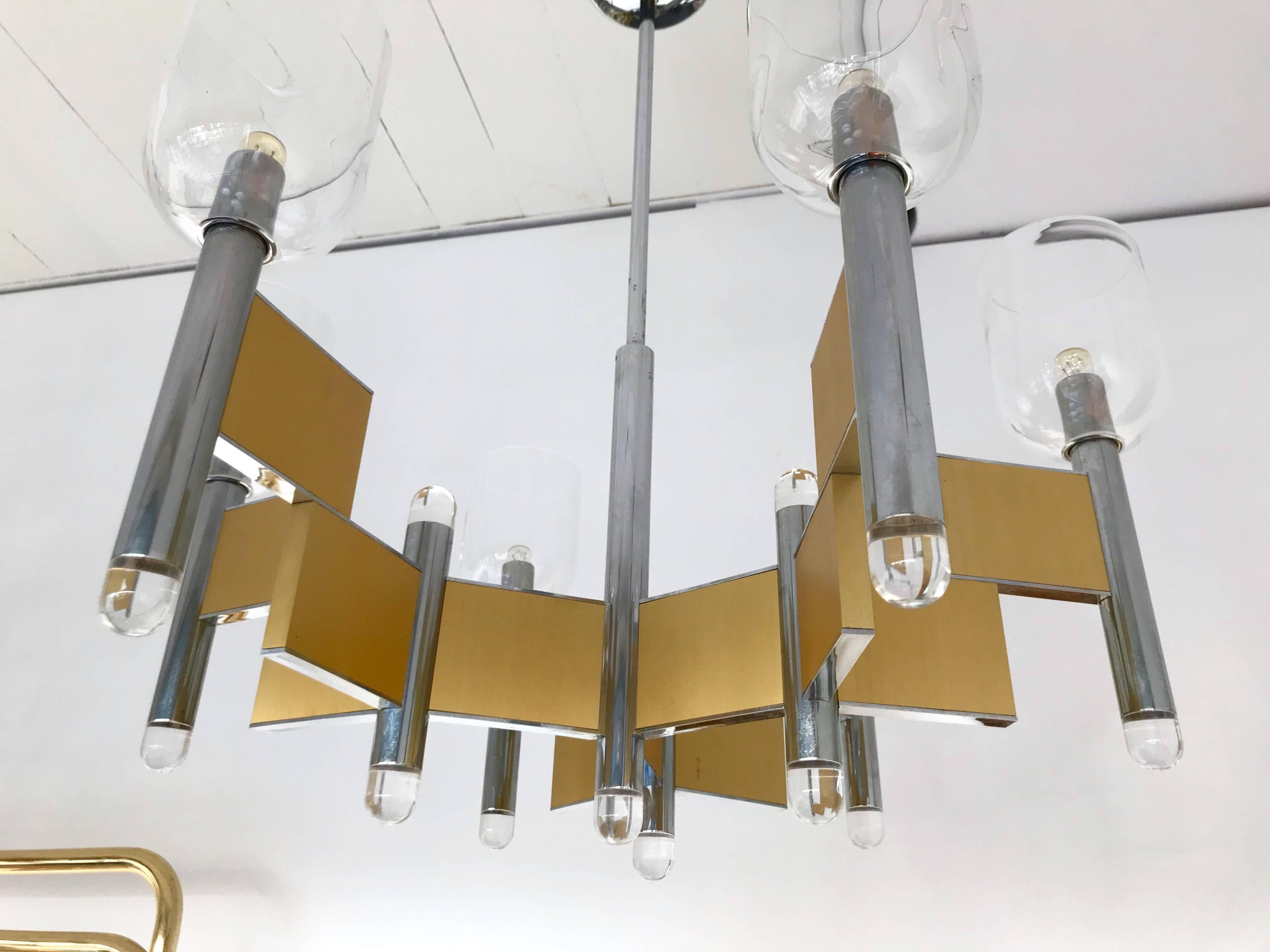 Nice chandelier or ceiling pendant light model by the designer Gaetano Sciolari. Brass, metal chrome and glass cabochon.
