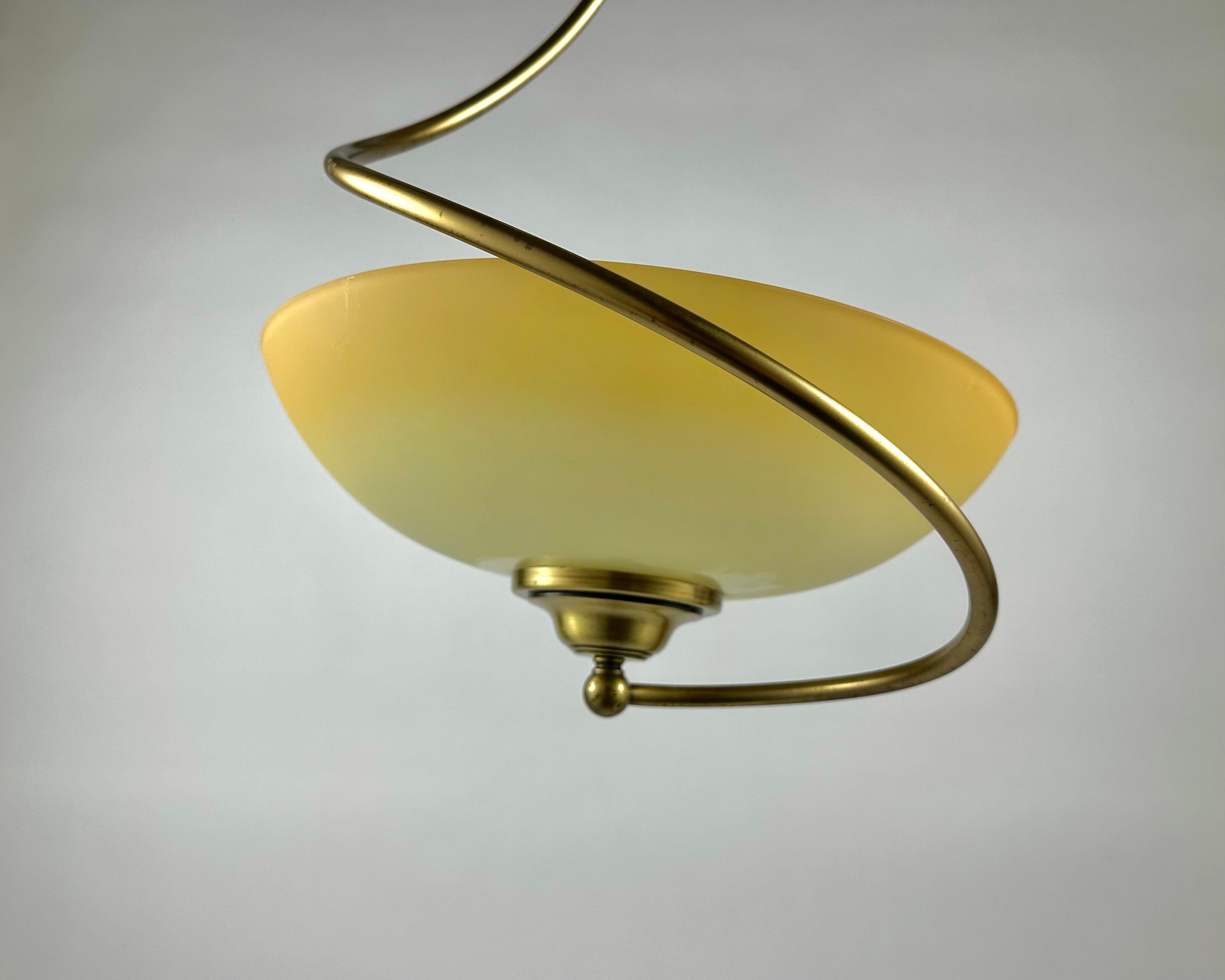 This Art Deco style hanging light was manufactured by CVL in France.

Chandelier or ceiling lamp made of brass. All CVL luminaires are the result of an absolute requirement: to make every model, every product an expression of know-how, combining