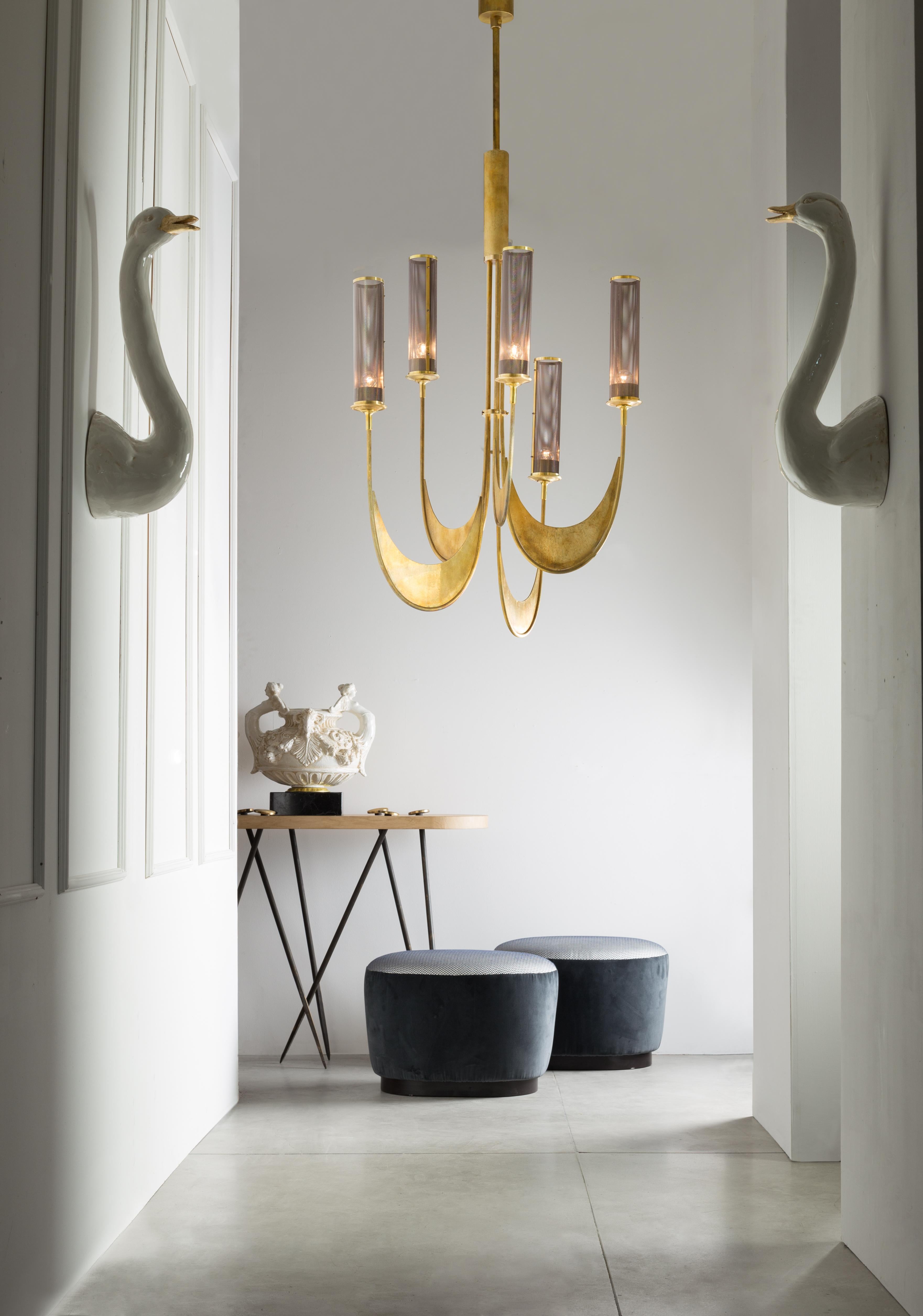 Chandelier in natural brass all engraved by hand in “Fabric Effect”. Lampshade in metal.
The height in the photo is 190cm but can be shortened to the desired size.