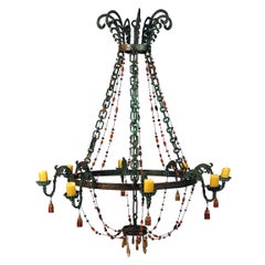 Lampadario in bronzo scolpito con vetro soffiato a mano