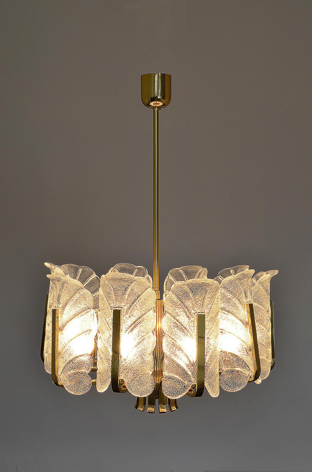 This large chandelier features ten decorative glass acanthus leaves and was designed by Carl Fagerlund for Orrefors in the 1960s.