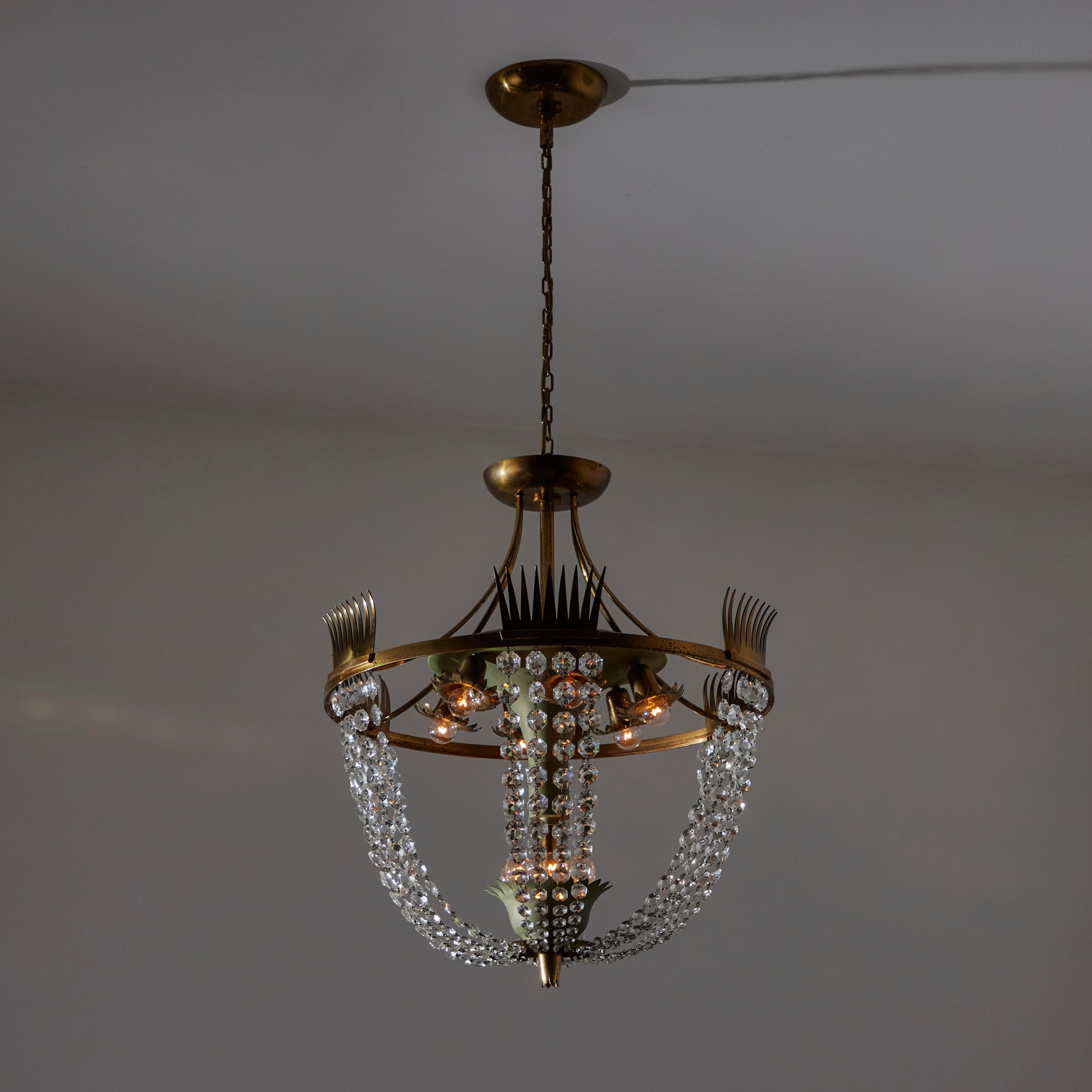 Chandelier by Pietro Chiesa for Fontana Arte, Italy, 1940s. A beautifully crafted ornate glass chandelier comprising of an aged brass framework and beaded glass drapery. Sage green enamel detailing, as well as pronged brass fences on the top frame.