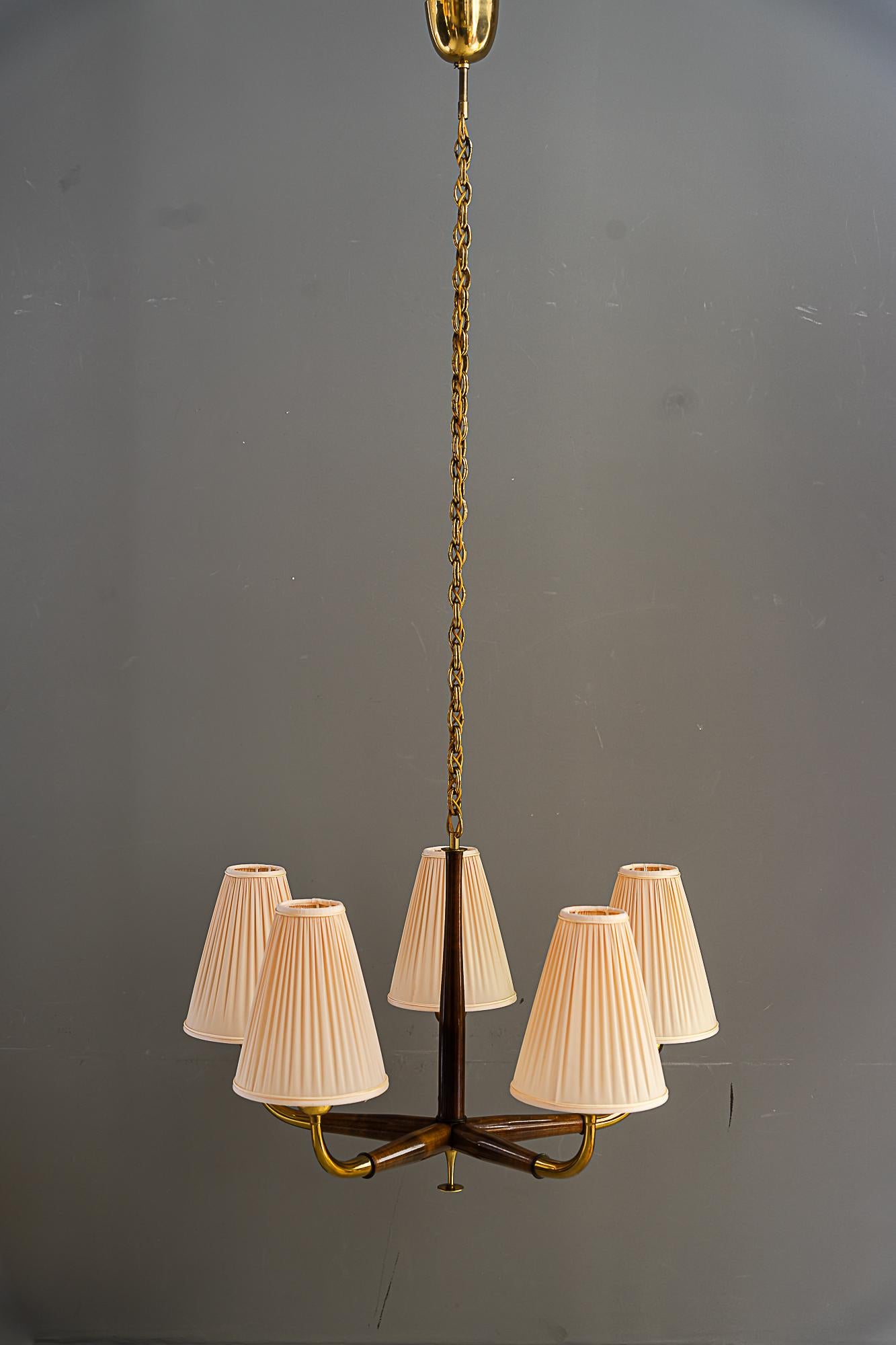 Chandelier by Josef Frank, 1930s with fabric shades
Form construction of beechwood, that has been stained in walnut colour
The shades are replaced ( new )
