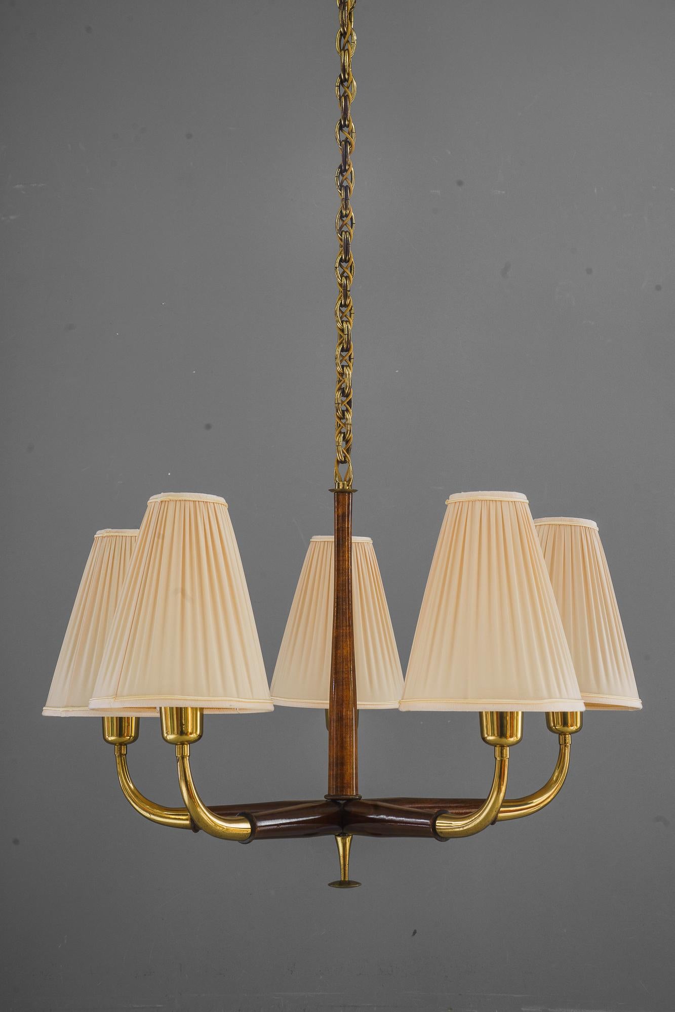 Chandelier by Josef Frank, 1930s with fabric shades
Form construction of beechwood, that has been stained in walnut colour
Original condition
The shades are replaced ( new )