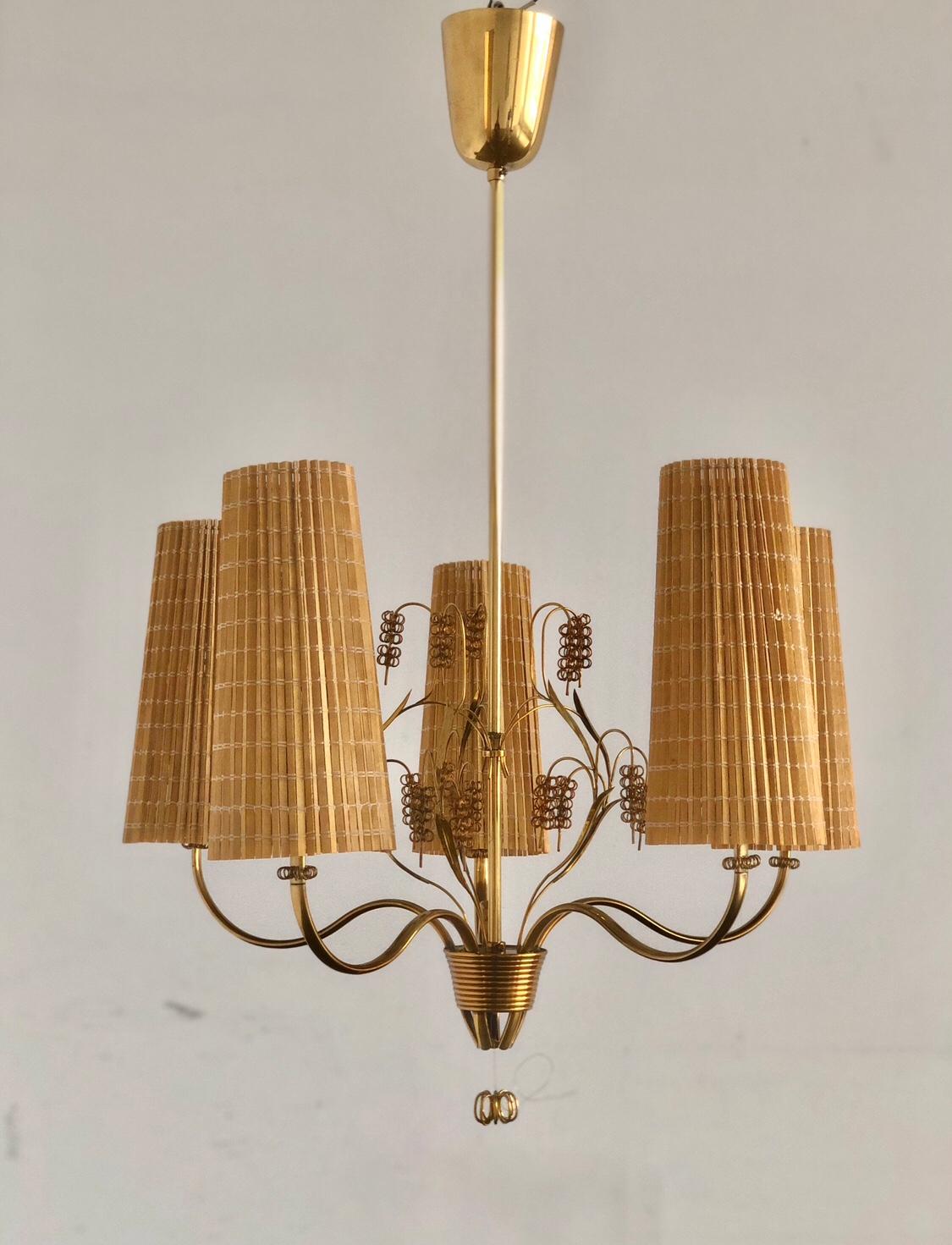 A Chandelier designed by Paavo Tynell for Taito Oy, Model 9015. Finland , circa 1940th.
Marked ” OY TAITO AB 9015 ”.  Measures : Diameter 23? ; Height 33?.
Two fixtures available. Rewiring available upon request.
Price is for each fixture.