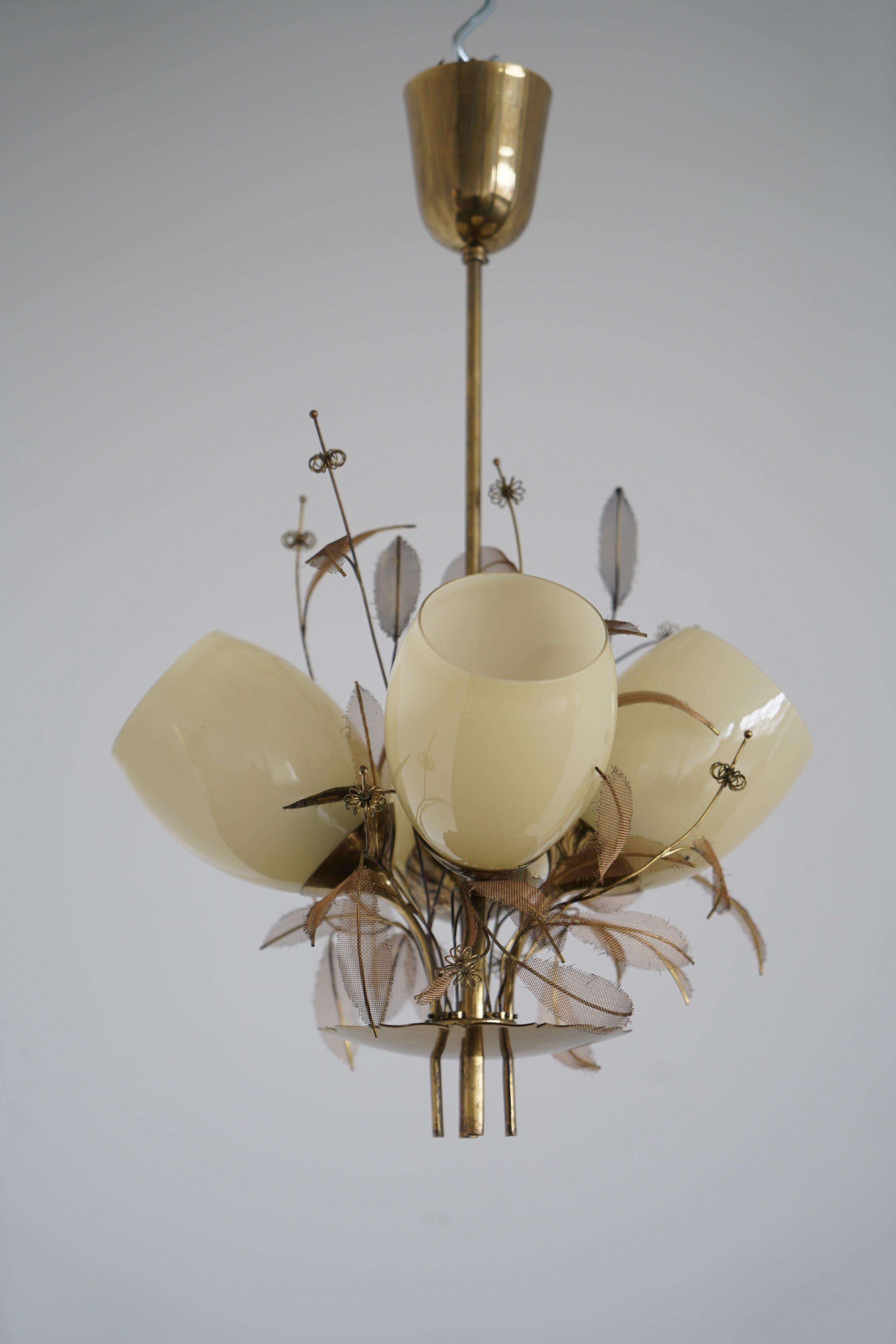 Chandelier designed by Paavo Tynell, Model 9029/4 for Taito, Idman. Finland circa 1950th. Marked 