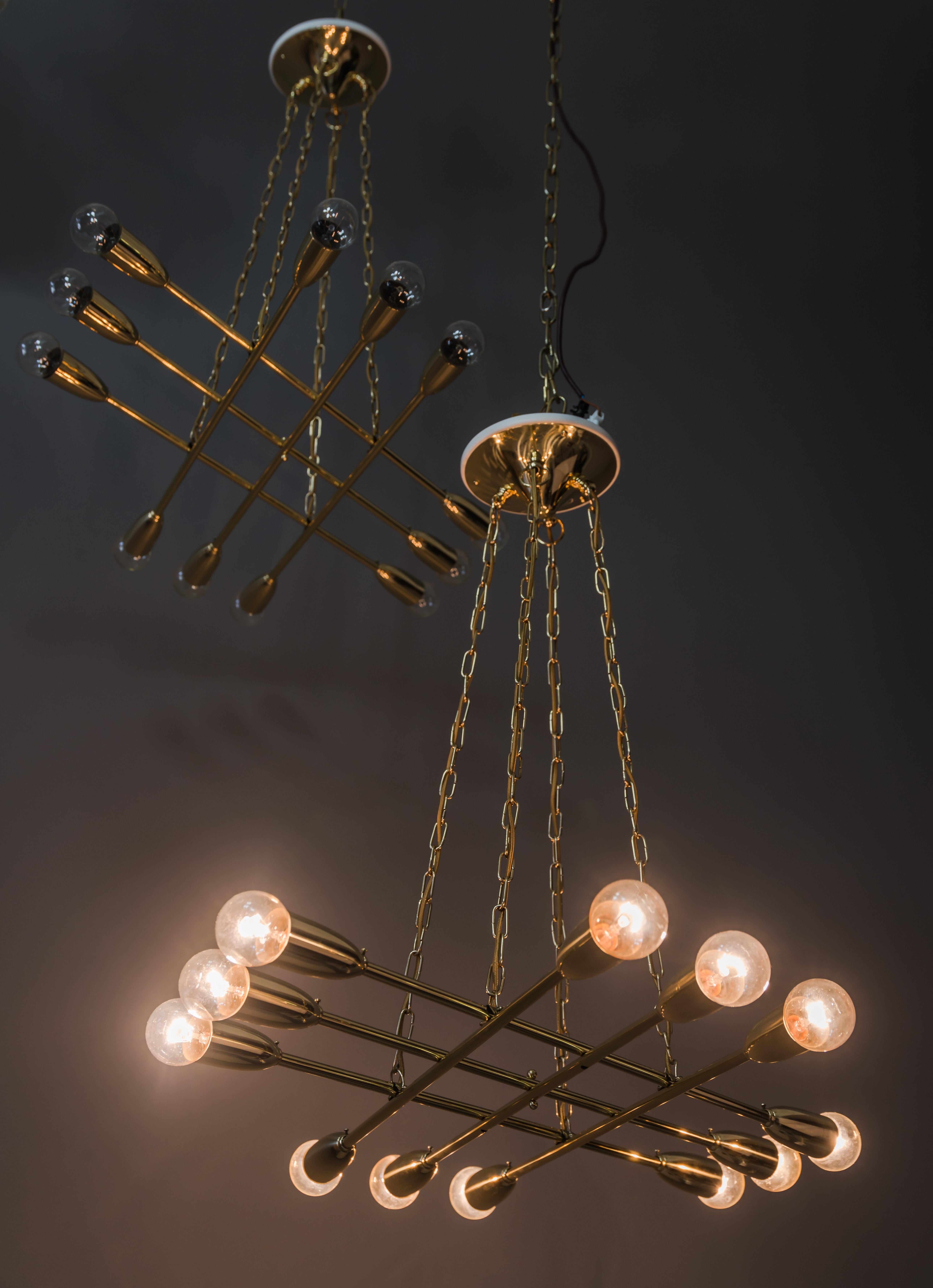 Chandelier by Rupert Nikoll, Vienna, 1950s
We can arrange to adjust the height of this chandelier to any length you wish as a free service.
Polished and stove enamelled
12 bulbs