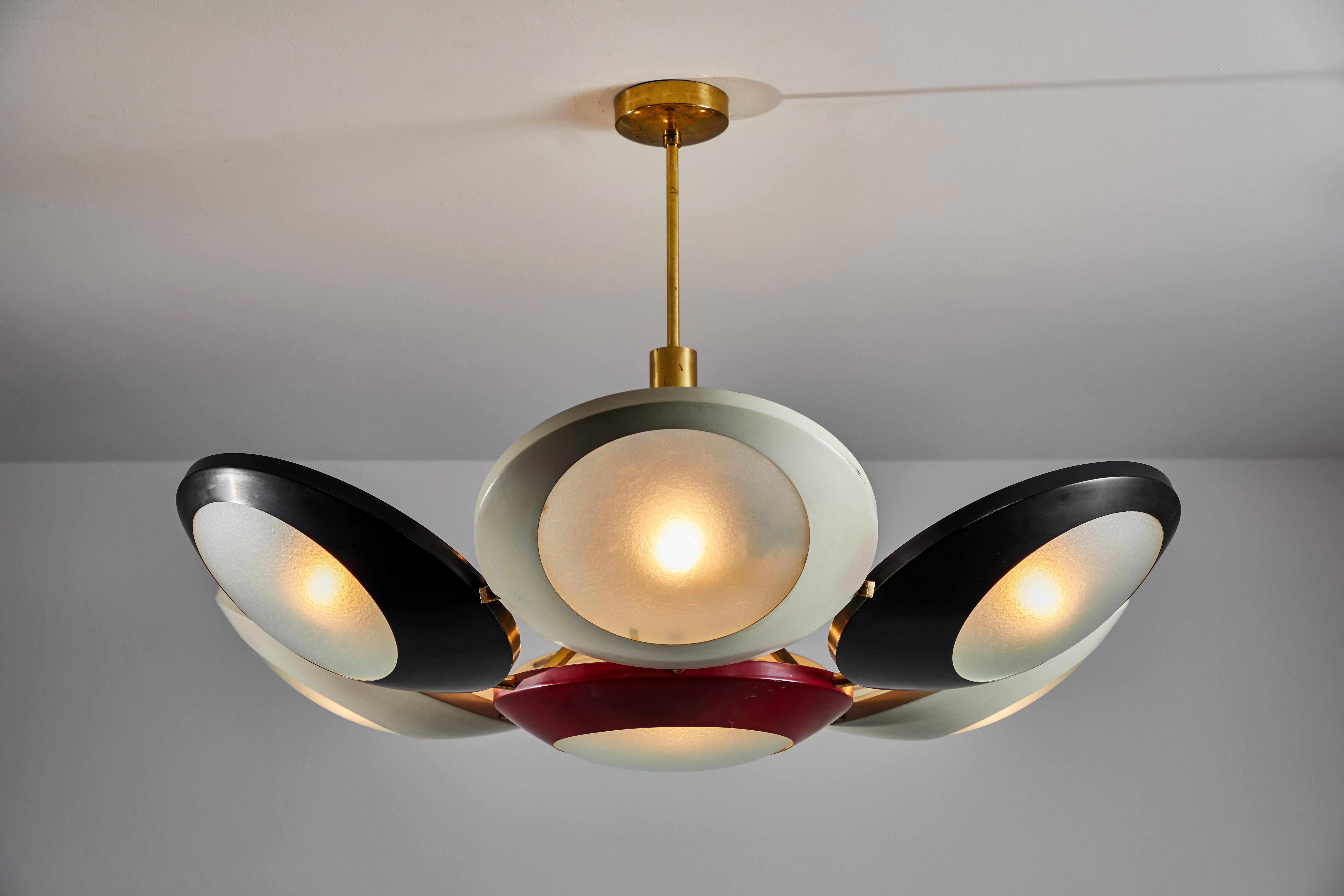 Seven shade chandelier by Stilnovo. Manufactured in Italy, circa 1950s. Brass, textured glass and original enameled metal. Rewired for U.S. junction boxes. Maintains original manufacturers label. Takes seven E27 60w maximum bulbs. Bulbs provided as