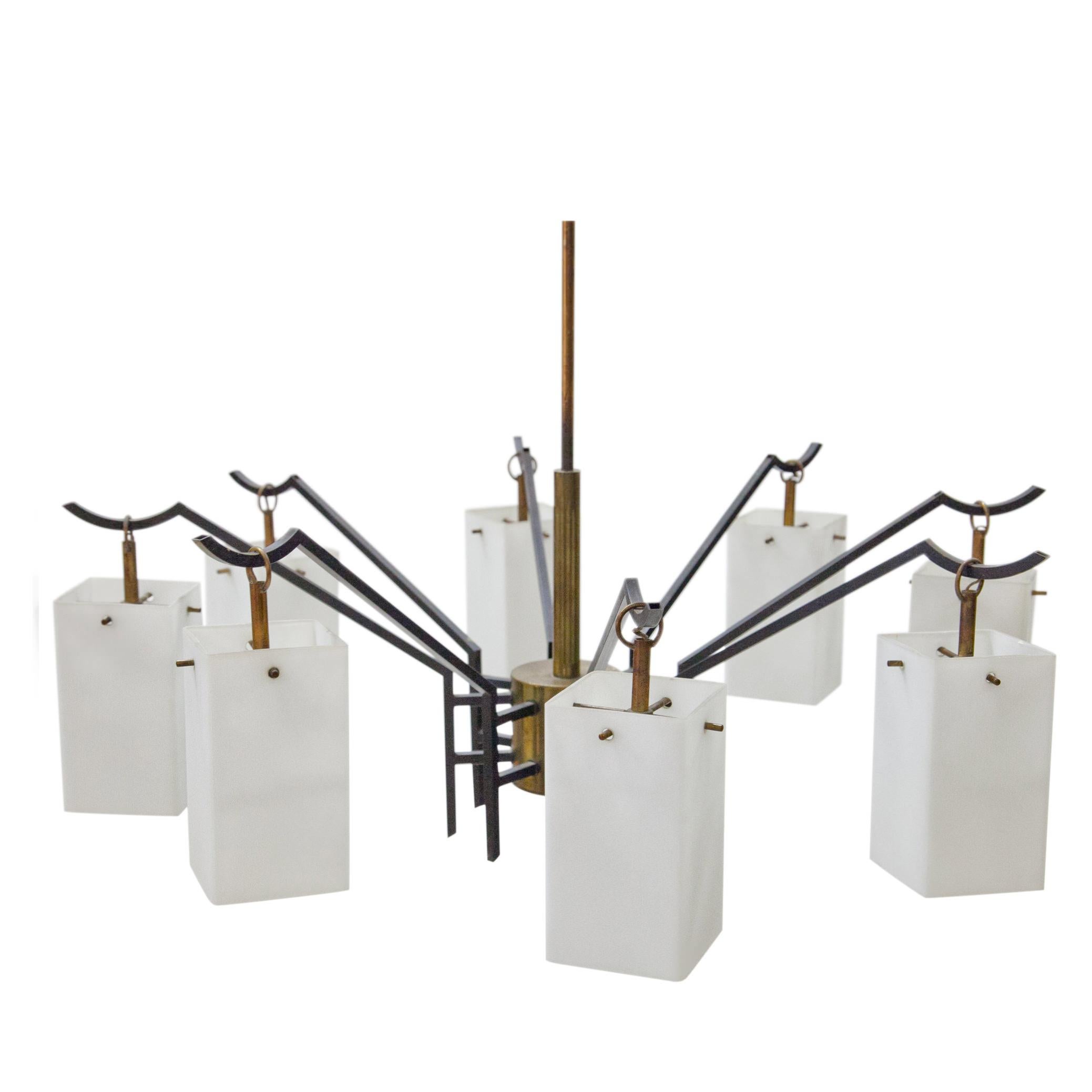 8-armed chandelier in brass and iron with rectangular opaque glass shades by Stilnovo, Italy, mid-20th century. 

For the electrification we assume no liability and no warranty.