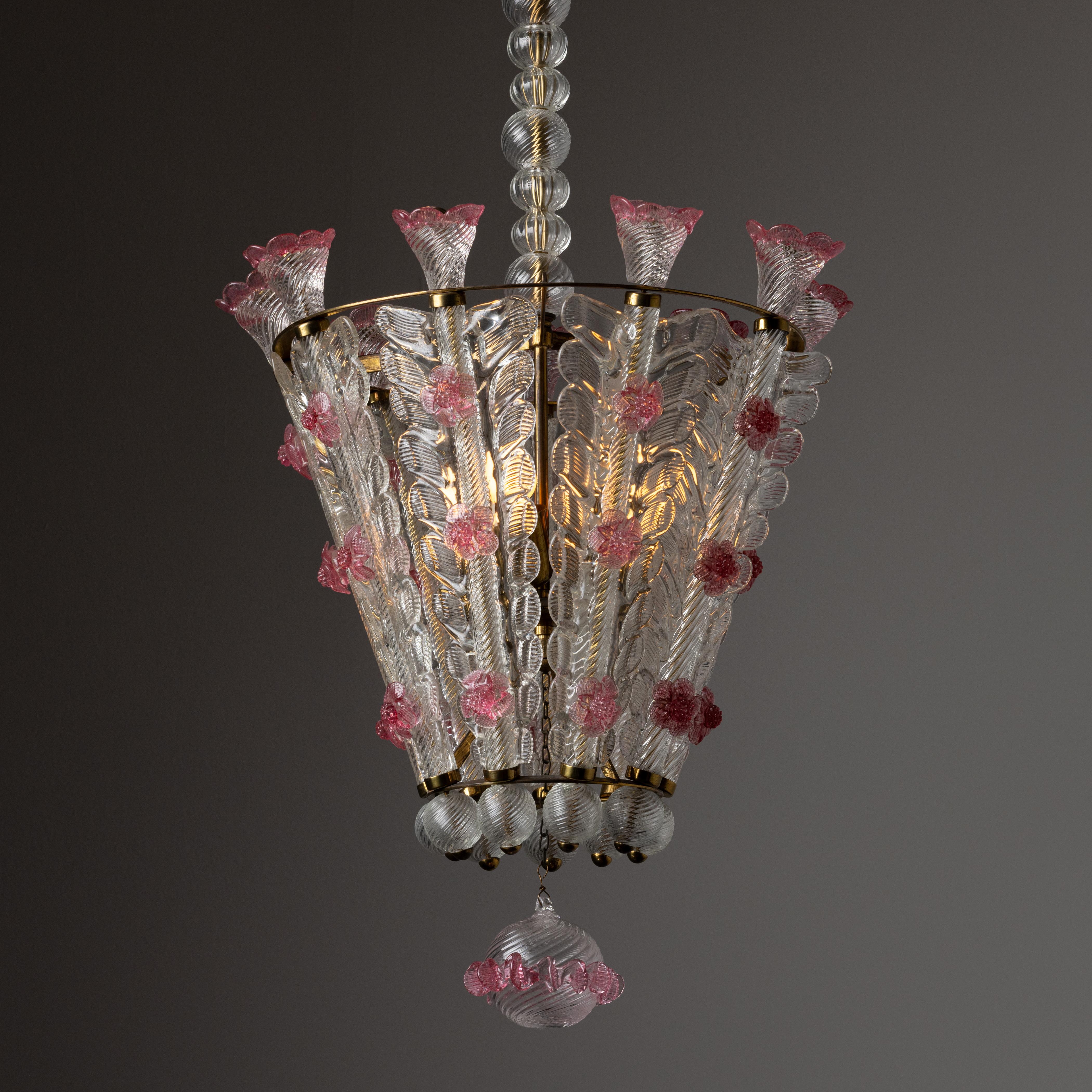 Chandelier by Tomaso Buzzi for Venini. Designed and manufactured in Italy, circa the 1940s. An extremely striking elegantly crafted chandelier comprising of multiple pressed glass in forms of stems, petals and blooming flowers running vertically