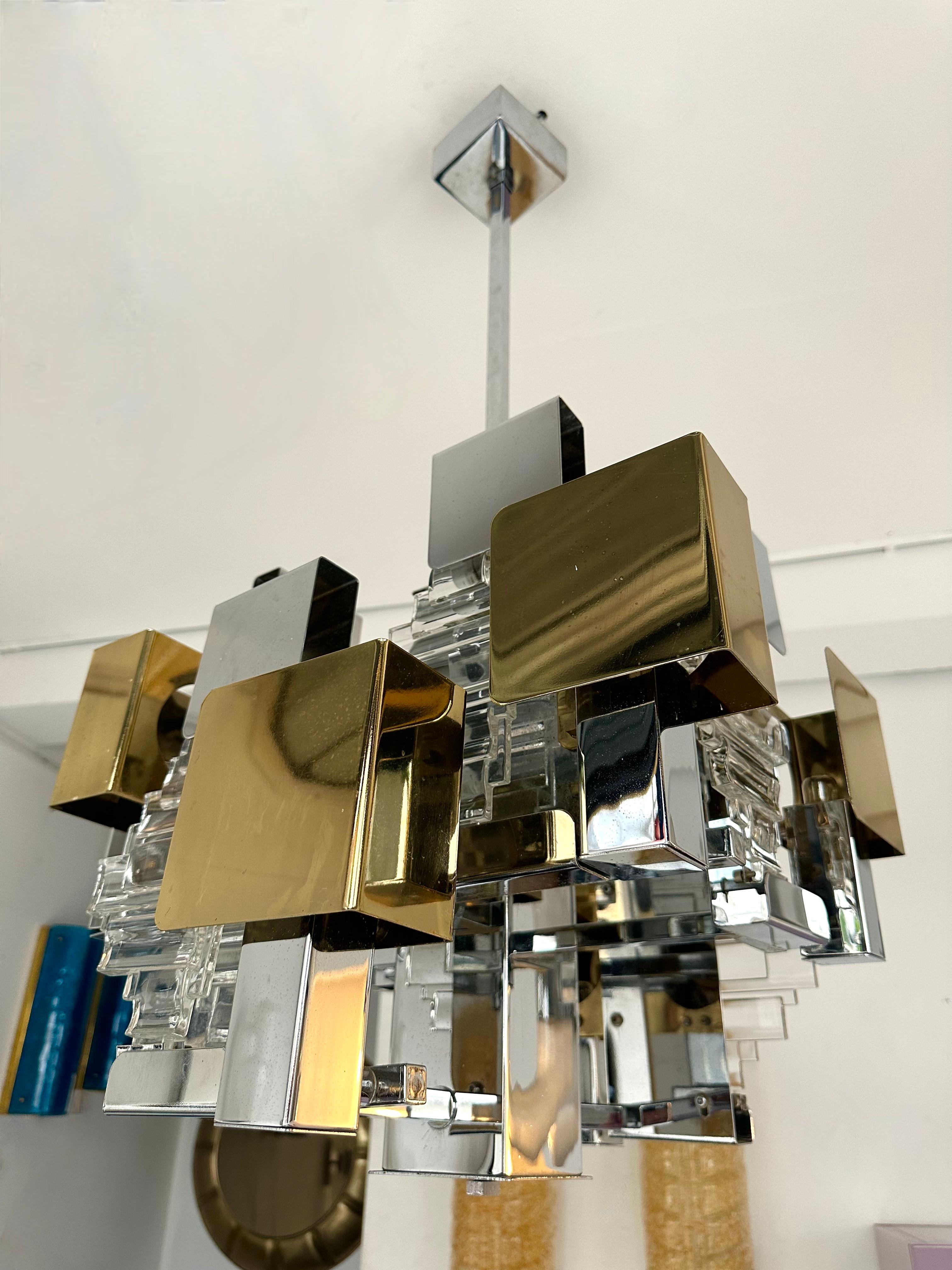 Mid-Century Modern Space Age Chandelier ceiling pendant light lighting by the italian designer Gaetano Sciolari for one of his editor Stilkronen. Metal chrome, brass and glass. Famous design like Reggiani, Stilux, Esperia.