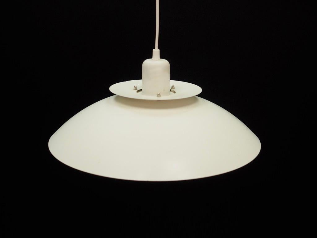 Original lamp from the 1960s-1970s, minimalistic Scandinavian design. Lamp in white. Preserved in good condition (minor abrasions and scratches, no headlining) - directly for use.

Dimensions: diameter 45 cm.