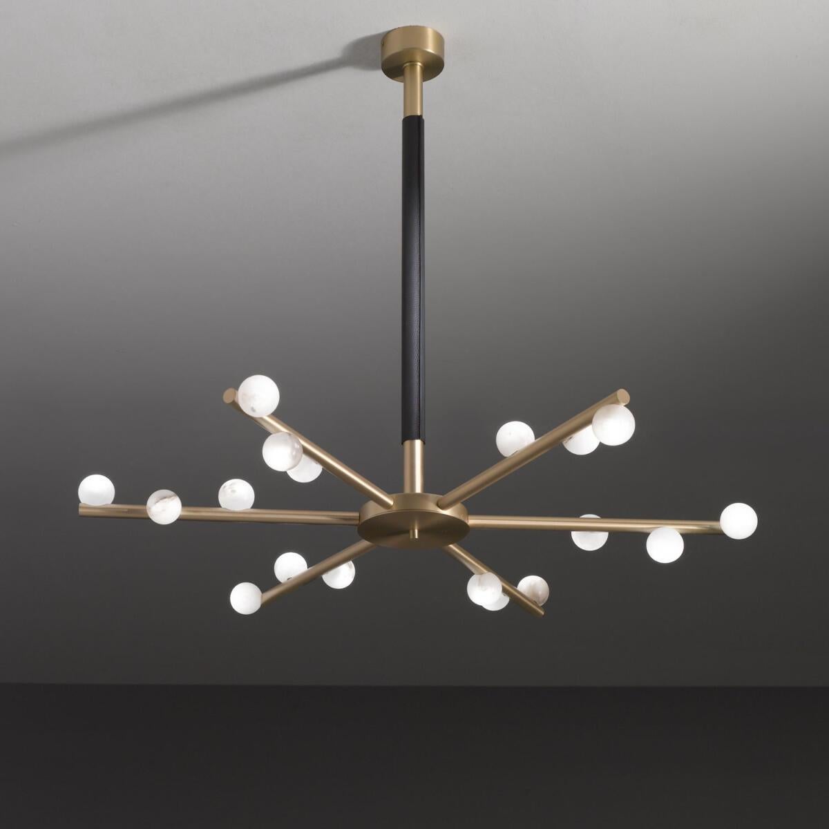 Demetra Brushed Brass Chandelier by Alabastro Italiano
Dimensions: D 97 x H 82 cm
Materials: Italian white alabaster, Italian hand wrought iron, brushed brass, black Africa leather
Other finishes available.
Light source 18 x LED 3 Watt, Tot. 5220