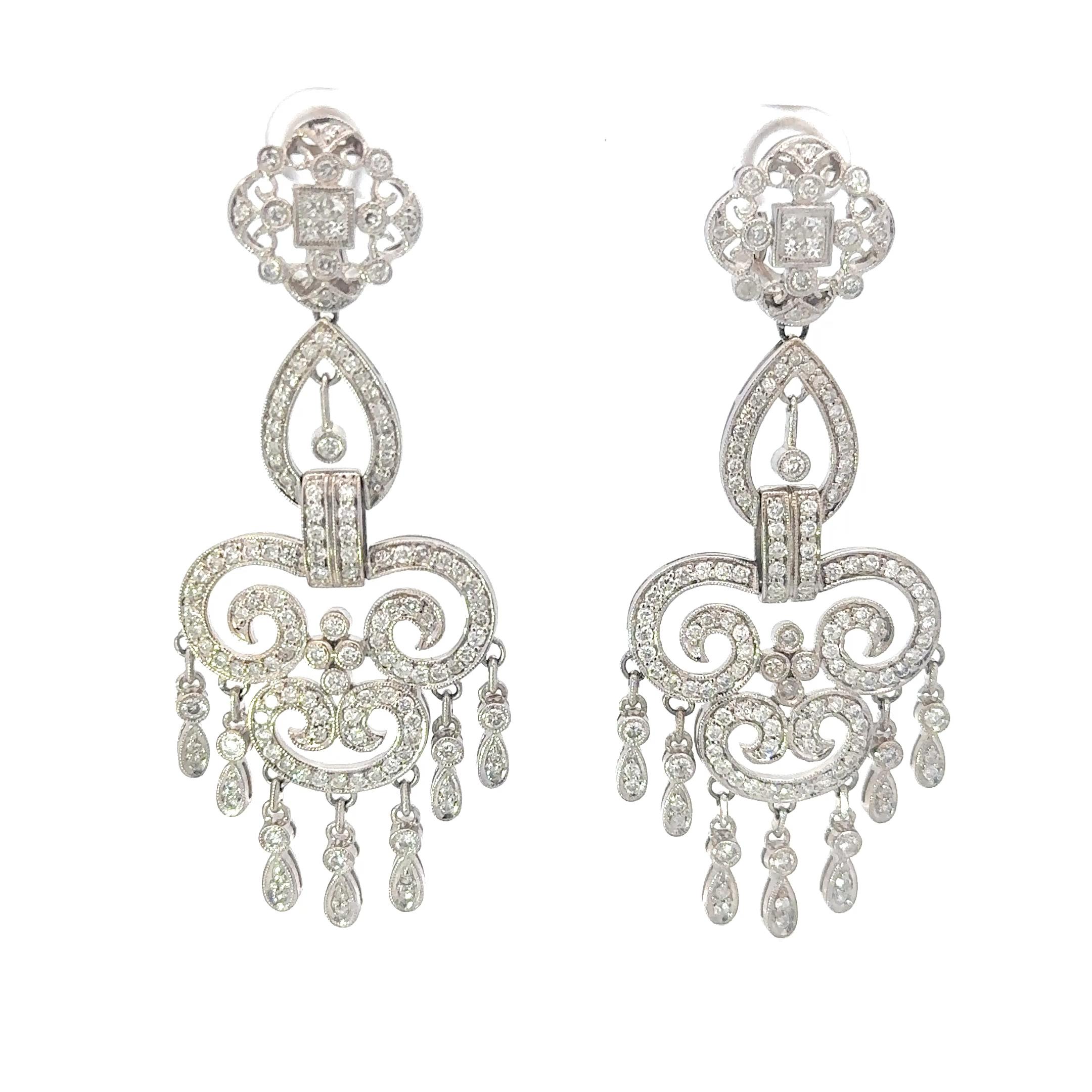 Chandelier Diamond Approximately '4ctw' Earrings in 14k White Gold with Omega Clips.
Diamonds G-H in color, SI1-SI2 in clarity