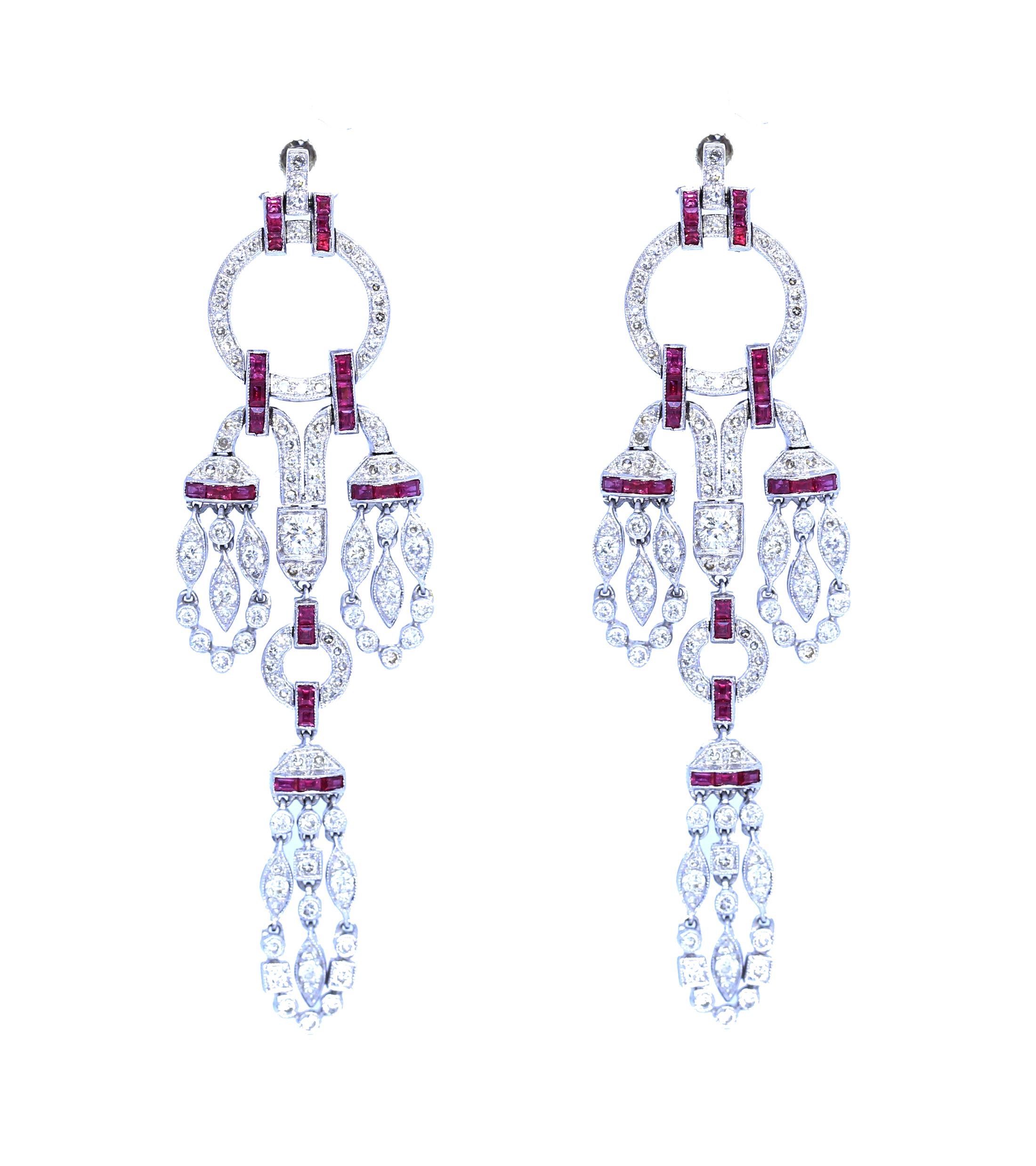 Chandelier Earrings with Diamonds and Rubies.
Containing 178 round brilliant and single cut diamonds weighing approximately 1.88Ct total and 50 baguette-cut rubies.
Freely moving parts ensure that the earring sits perfectly on the ear. Delicate and
