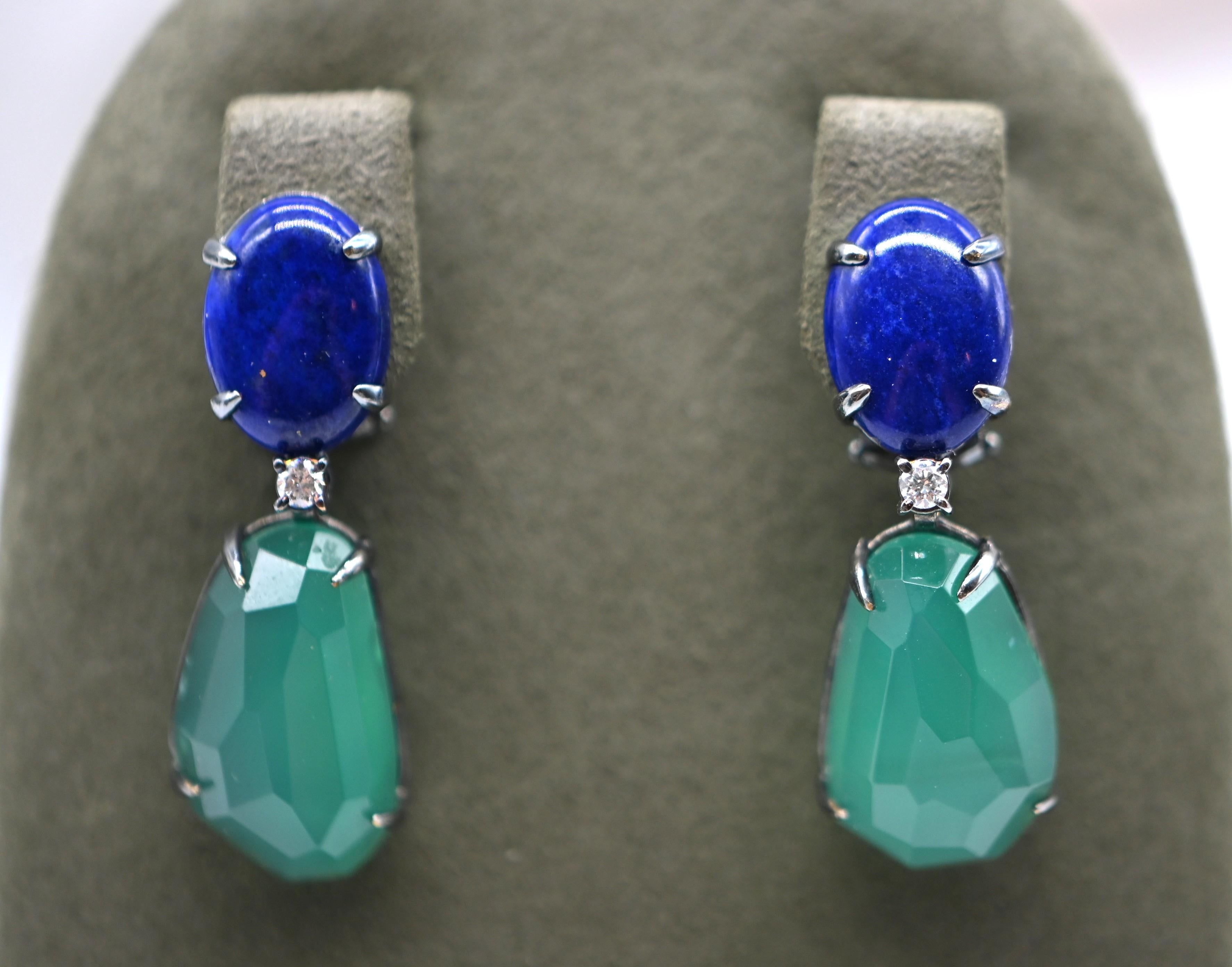  The fusion of timeless elegance and natural splendor with our Lapis Lazuli and Green Moonstone earrings, adorned with diamonds and featuring an 18-carat Black Gold chandelier. At 1st Dibs, we are proud to present this exquisite piece that embodies