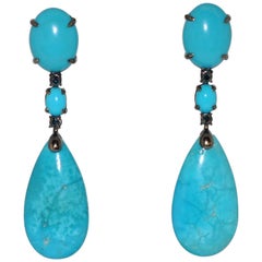 Boucles d'oreilles chandelier Turquoises Saphirs bleus Or noir 18 carats