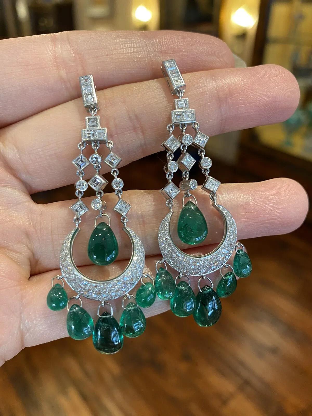 Chandelier Emerald Briolettes and Diamond Drop Earrings 21.31 Carat Total Weight in Platinum

Vintage Emerald Diamond Drop Earrings features 12 deep bright green Cabochon Briolette Emeralds and a mix of square cut and Single Cut Round Diamonds set