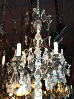 A very fine bronze and crystal Louis XV style "Cage" chandelier by Baccarat.