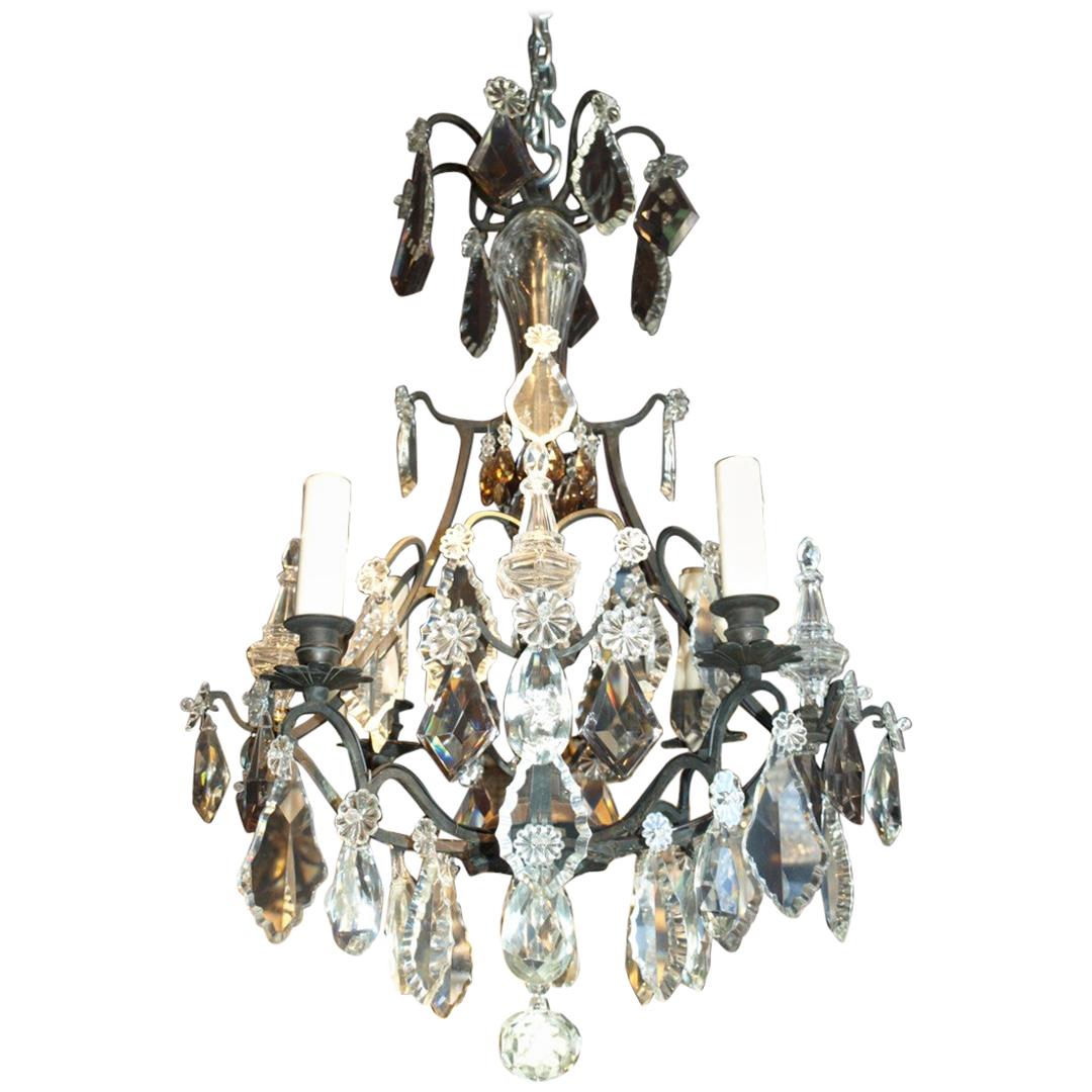 A very fine bronze and crystal Louis XV style "Cage" chandelier by Baccarat.