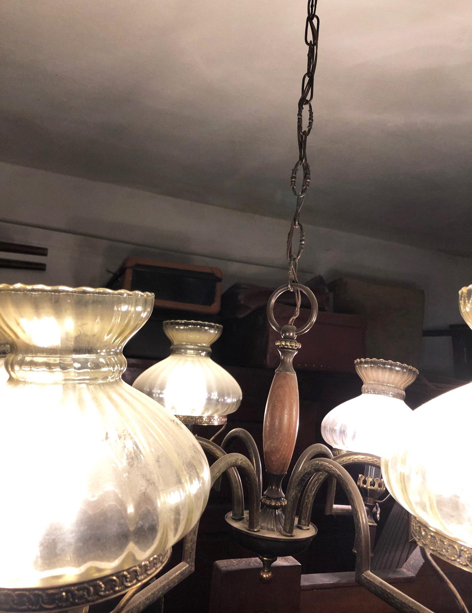Chandelier from 1960, original, Italian design, six lights, European E14 fixture
Made in wood, metal and glass
In working condition
We recommend buyers consults an experienced electrician for proper installation.
It will be delivered in a specific