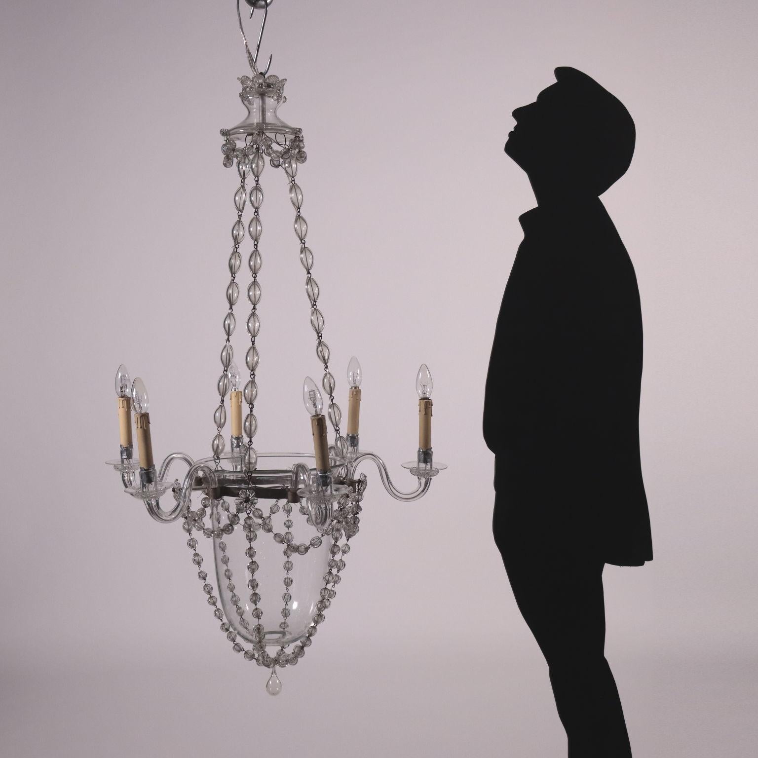Chandelier from the late 19th century with six lights, with an inverted glass bell in the centre, decorated with necklaces with blown glass beads.
