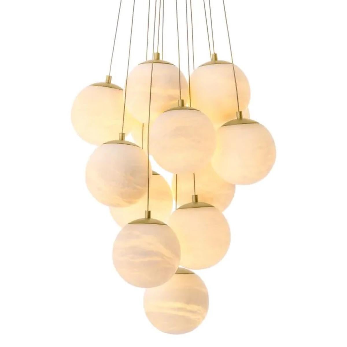 Beautiful chandelier with antique brass and alabaster finishes
Alabaster is a natural material, each piece differs in color, opacity and veining
Length hanging method 150 cm/59.06 inch
Dimensions: ø 68 x H. 90 cm.