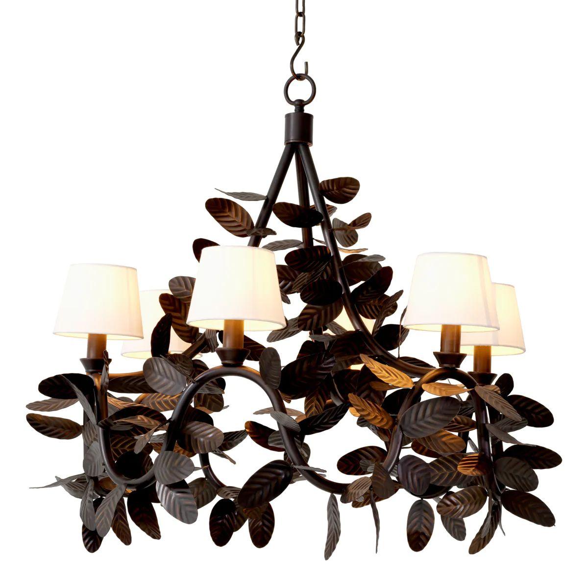 This chandelier in bronze finish is an elegant lighting piece designed with a rich composition of hand-formed leaves that create a sculptural and layered silhouette. Crafted to resemble organic foliage, the chandelier offers a warm and refined