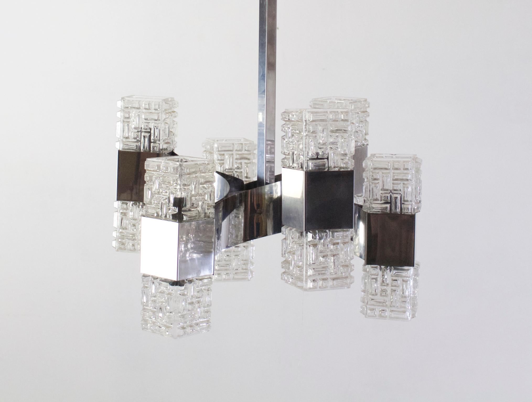Chandelier by Gaetano Sciolari with six arms in chrome and glass. Uses twelve E14 lightbulbs.