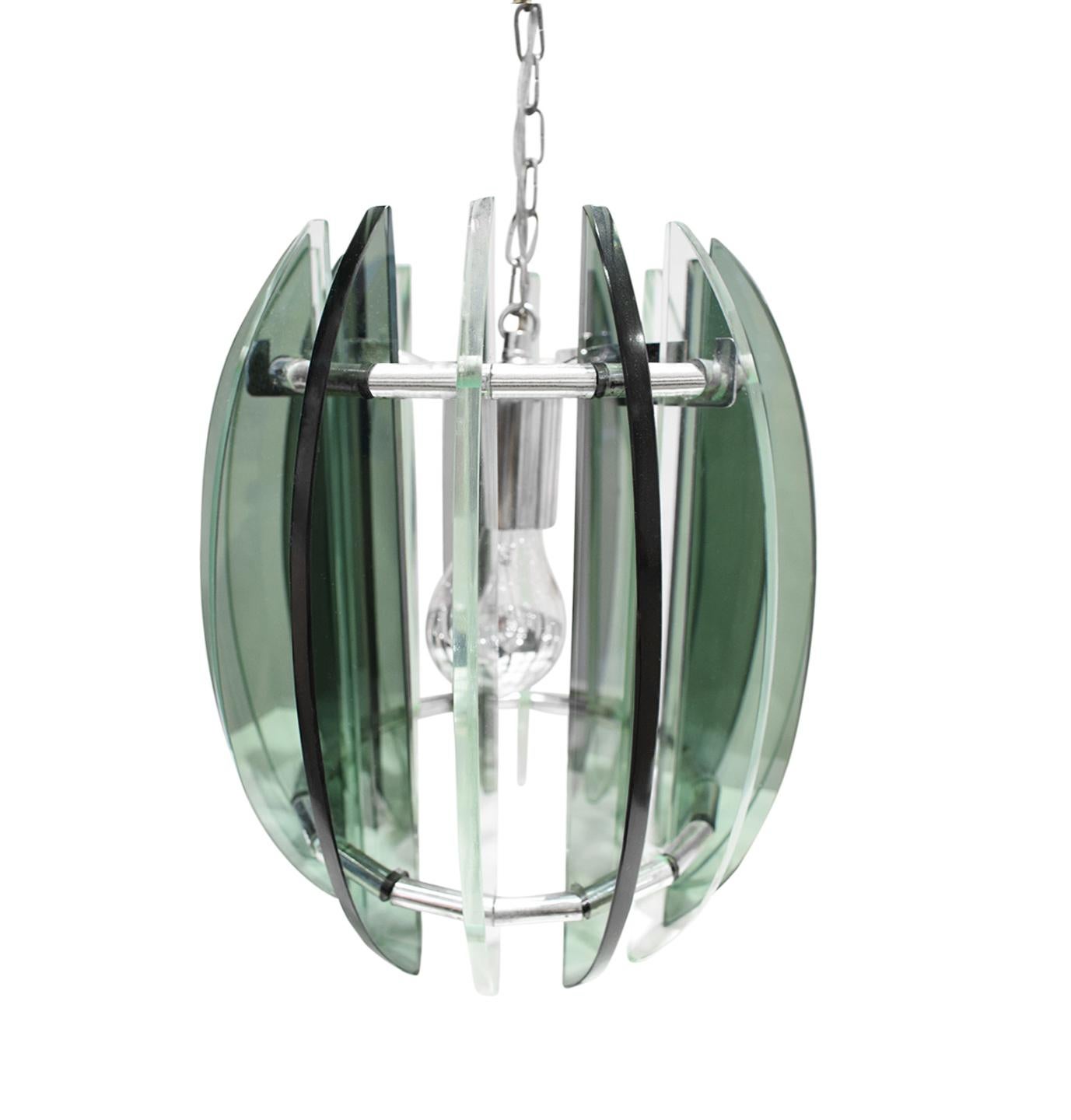 Chandelier in chrome with light and dark green glass in the style of Fontana Arte, Italian 1970s. The height of just the chandelier itself without the chain is 11 inches high. The overall height can be customized with a chain or rod. As currently