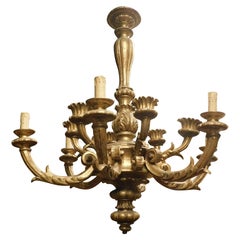 Lustre en bois doré et sculpté, seconde moitié du 19ème siècle, Italie