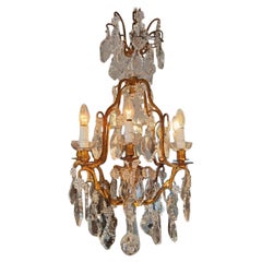 Chandelier in gilded bronze and Baccarat crystals