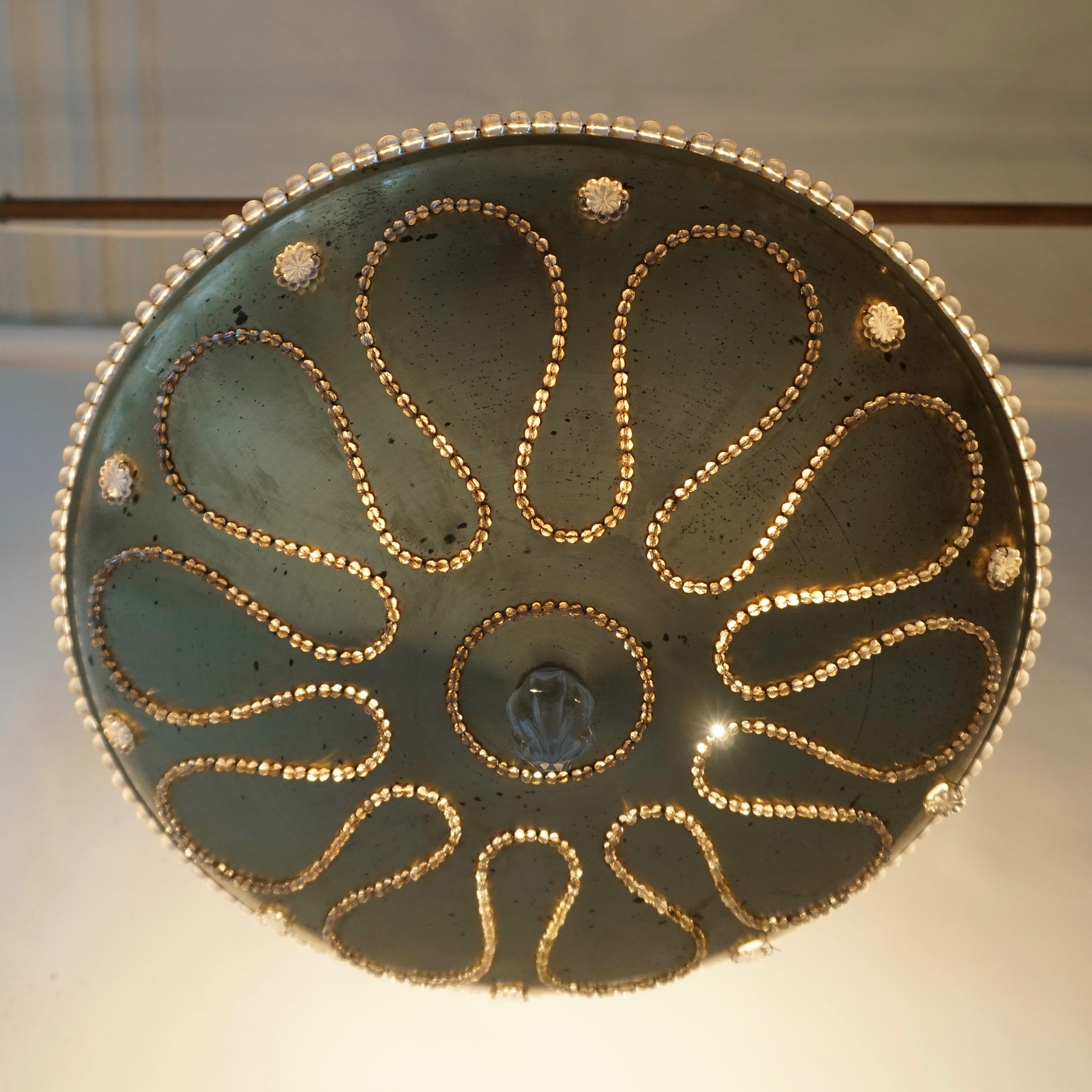 XX secolo Lampadario in metallo dorato e cristallo in vendita