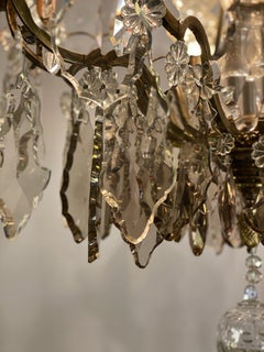 Chandelier in Gilt Bronze Garnished with Transparent and Golden Tassels