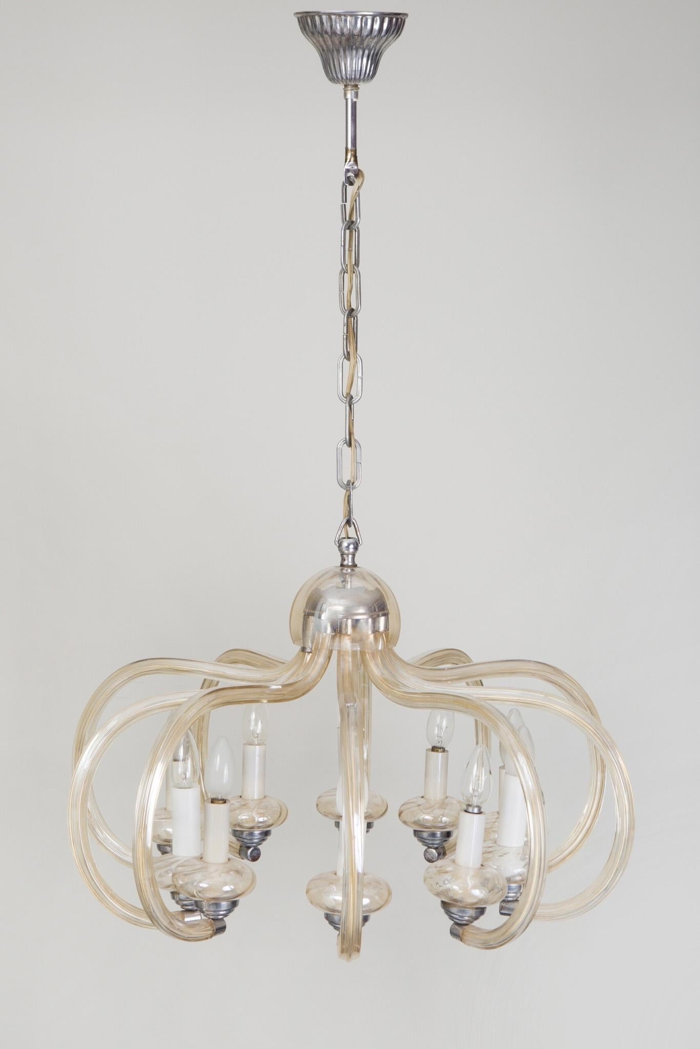Chandelier made out of glass in the 1920s
Original pristine condition. No damages.