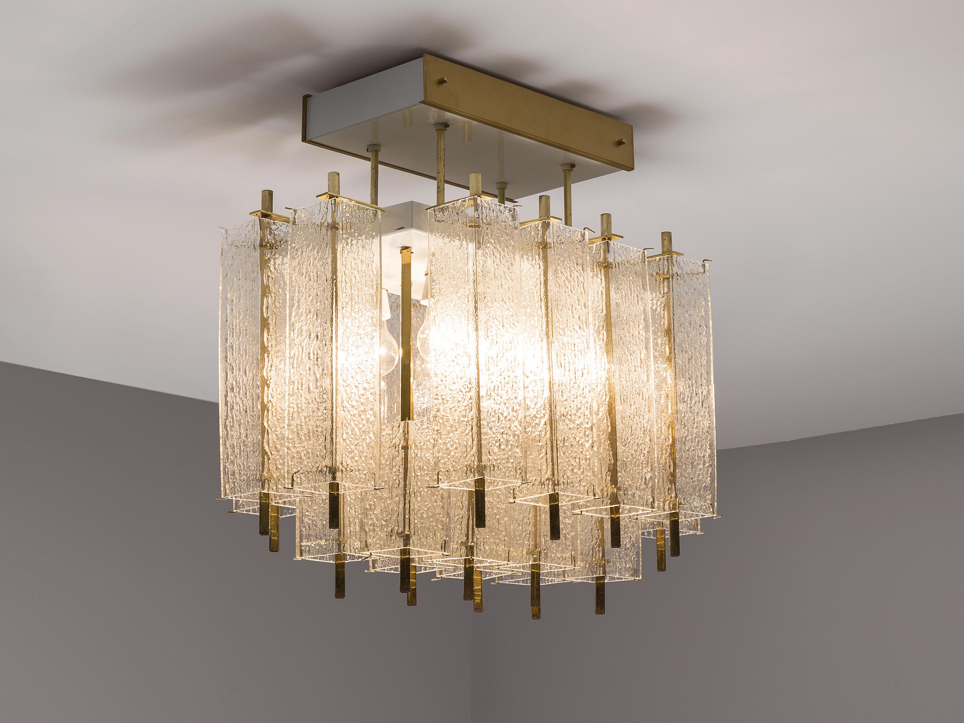 Chandelier, in glass and brass, Europe, 1970s. 

Beautiful chandelier made in Europe in the 1970s. This elegant square chandelier features a great amount of rectangular structured glass shades and a rectangular brass fixture. The frame is made of