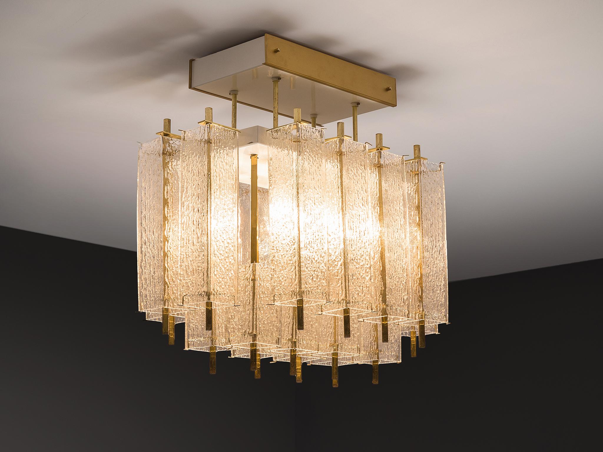 Chandelier, in glass and brass, Europe, 1970s. 

Beautiful chandelier made in Europe in the 1970s. This elegant square chandelier features a great amount of rectangular structured glass shades and a rectangular brass fixture. The frame is made of
