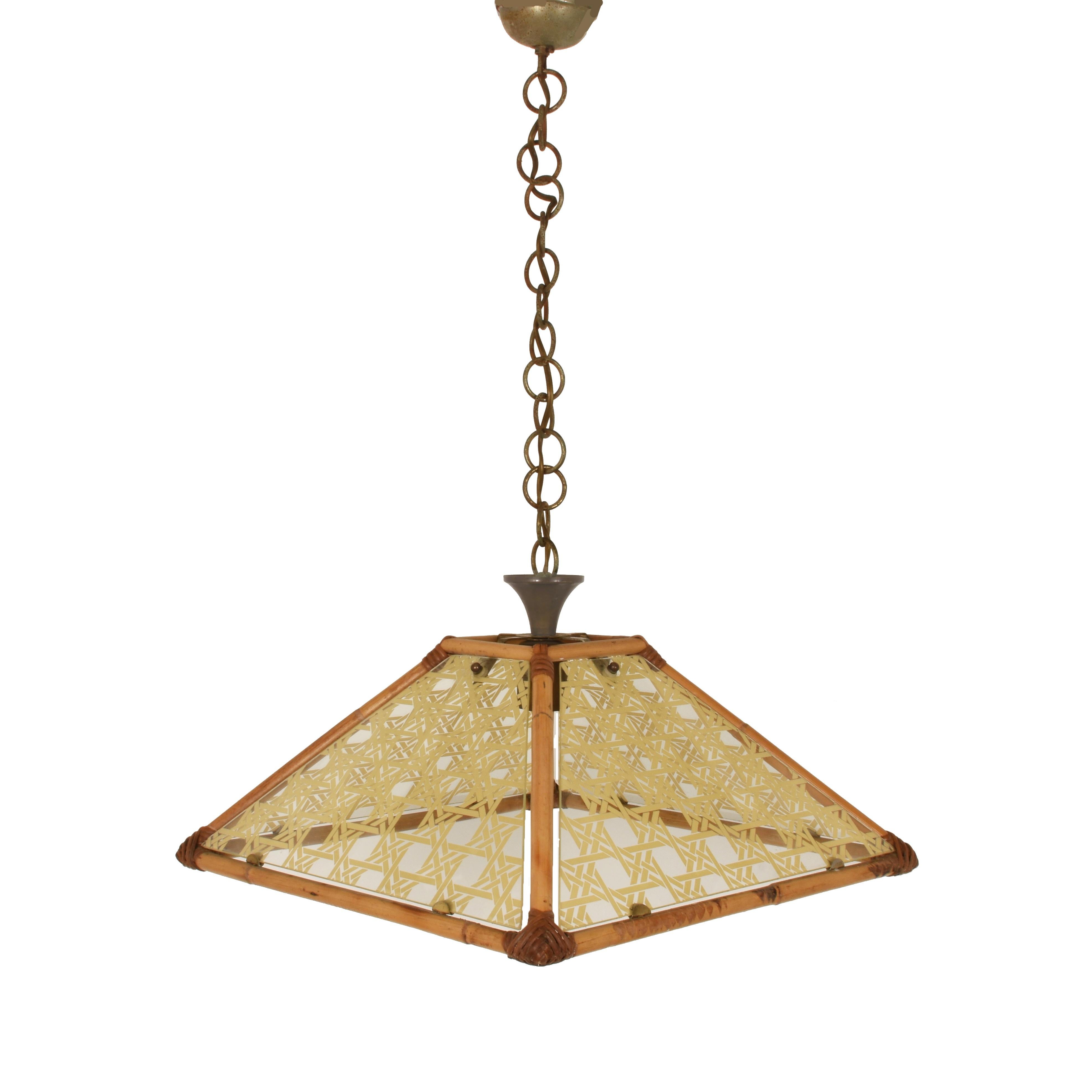 Chandelier in textured glass, rattan, bamboo and brass. Pendant Italy, 1970s.