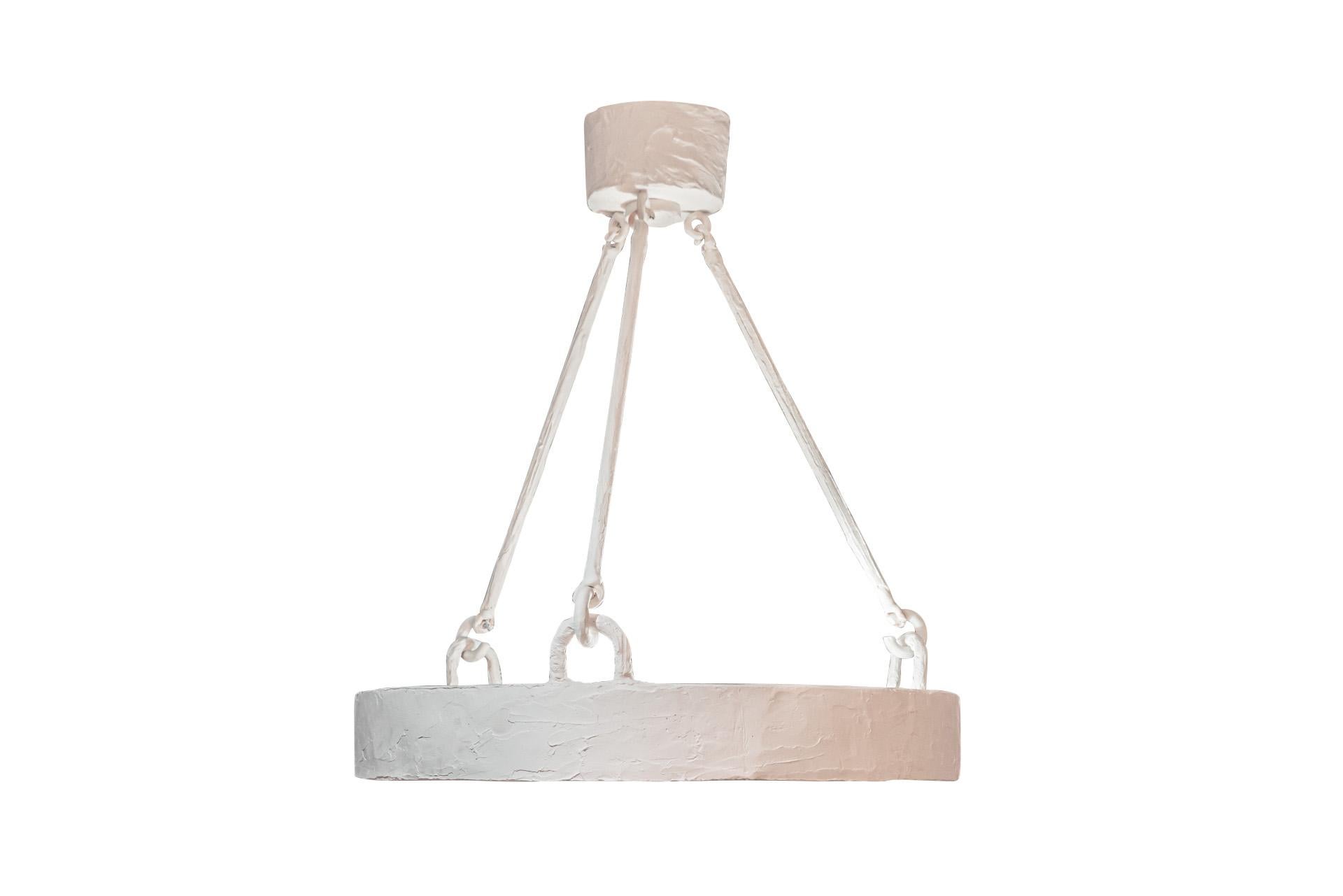 Chandelier in the style of Jean Michel Frank,
Iron and plaster,
The suspension with disc decoration,
circa 1970, France.

Measures: Height 90 cm, diameter 73 cm.