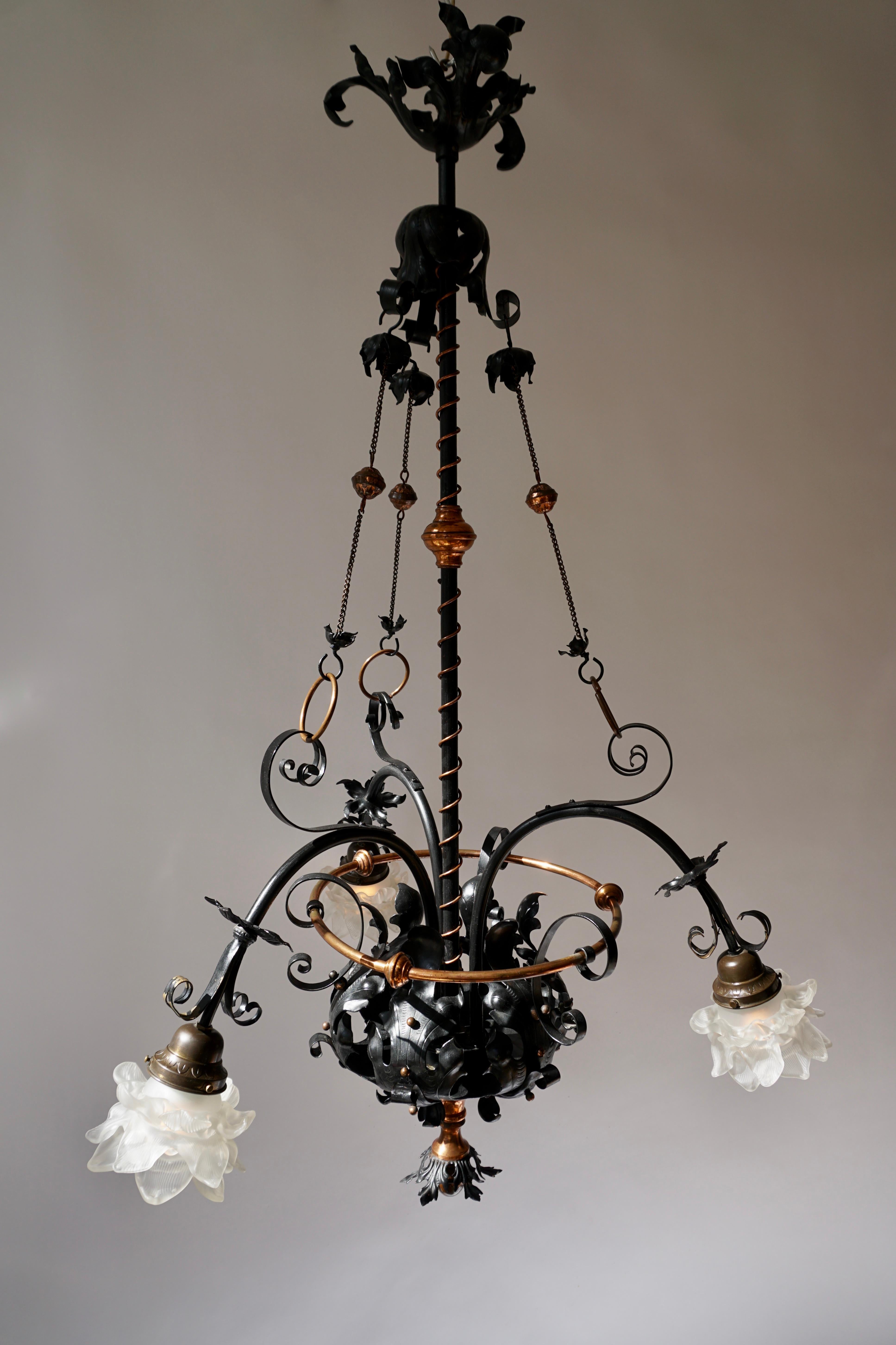 French Chandelier in Wrought Iron and Brass For Sale