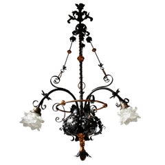 Lampadario in ferro battuto e ottone